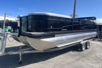 2026 Princecraft Vectra 23 L pontoon boat on trailer, sleek design, outdoor setting.