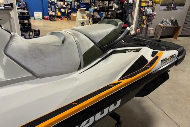 2020 Sea-Doo FISH PRO jet ski in showroom, featuring sleek design and comfortable seating.
