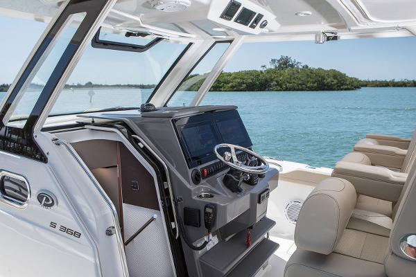 Manufacturer Provided Image: 2018 Pursuit S 368 Sport boat interior with helm station and seating.