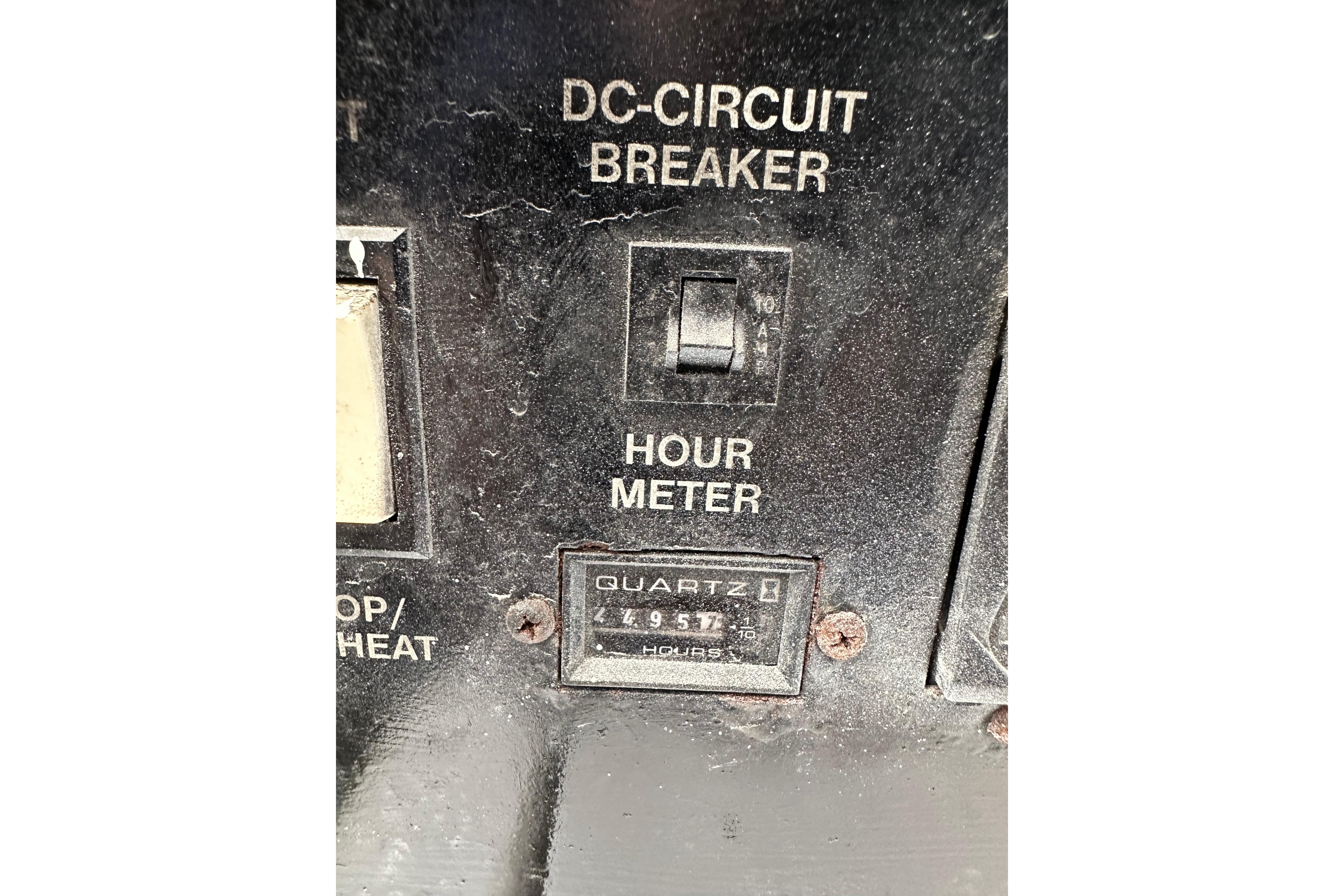 DC circuit breaker and hour meter on 2004 Azimut 55E yacht control panel.