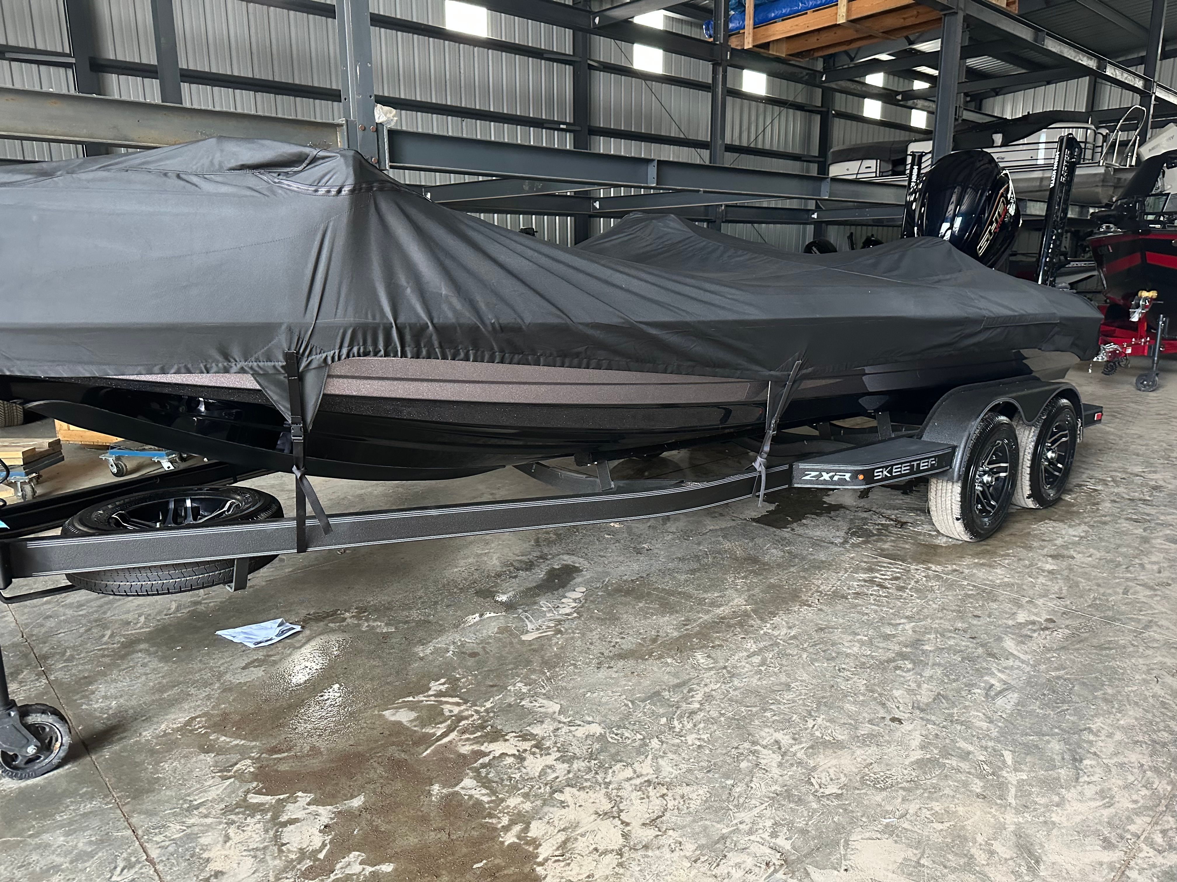 2024 Skeeter ZXR21 boat with cover in warehouse.