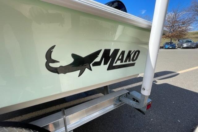 2026 Mako 18 Pro Skiff boat logo on trailer in parking lot.