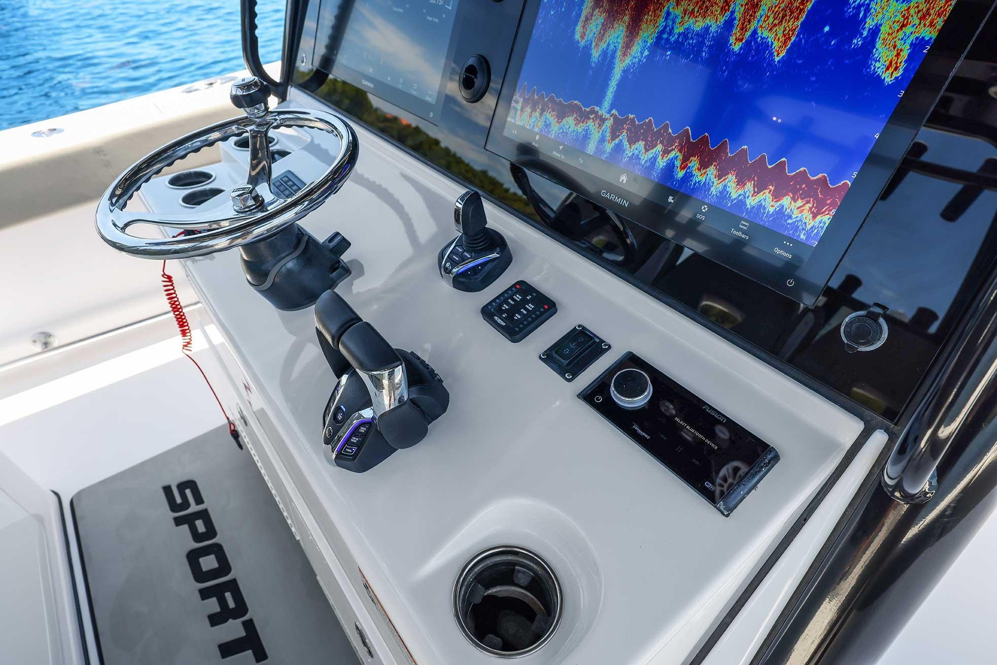 2024 Sportsman Open 352 Center Console dashboard with Garmin display and controls.
