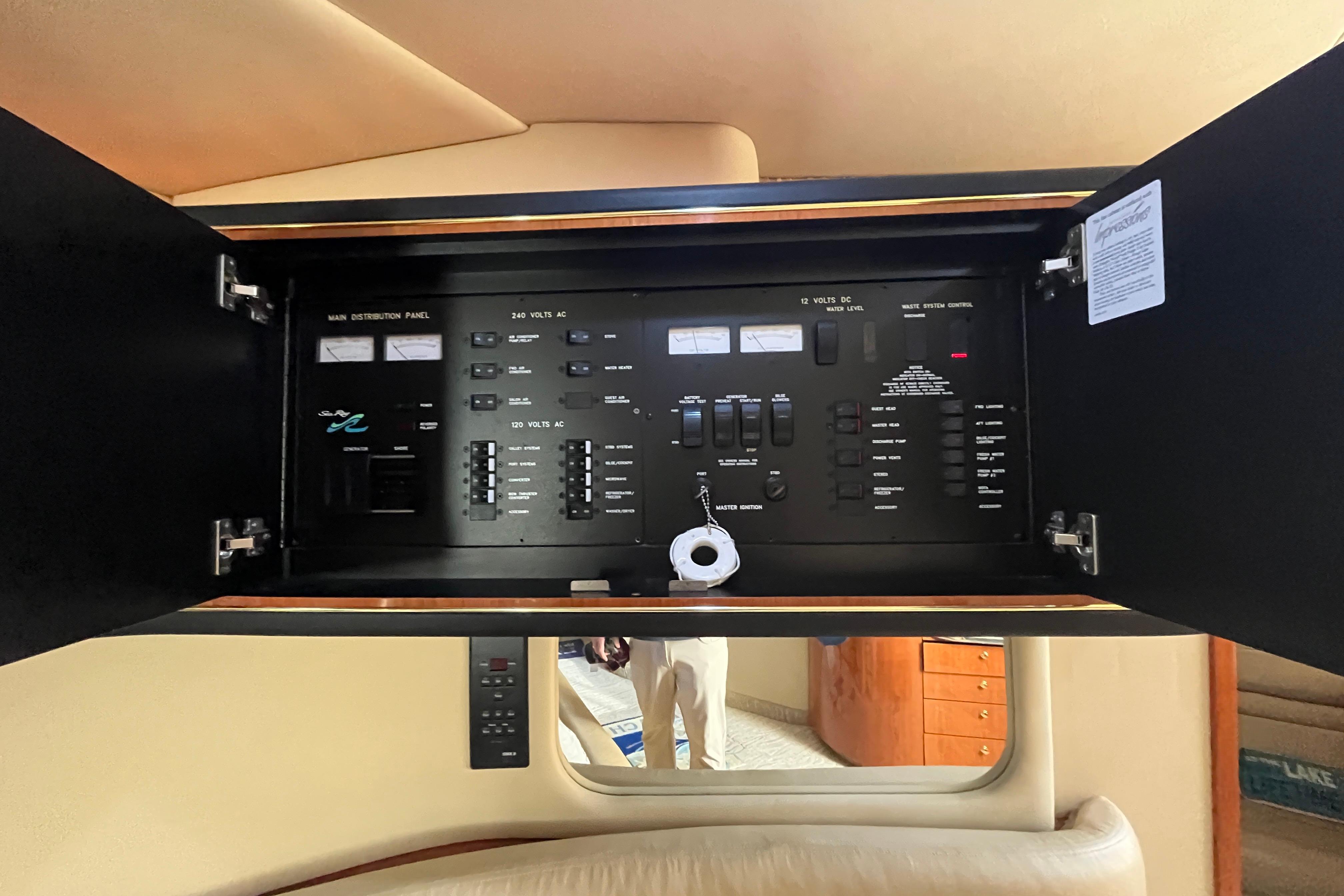 Electrical control panel inside a 2000 Sea Ray 460 Sundancer yacht.