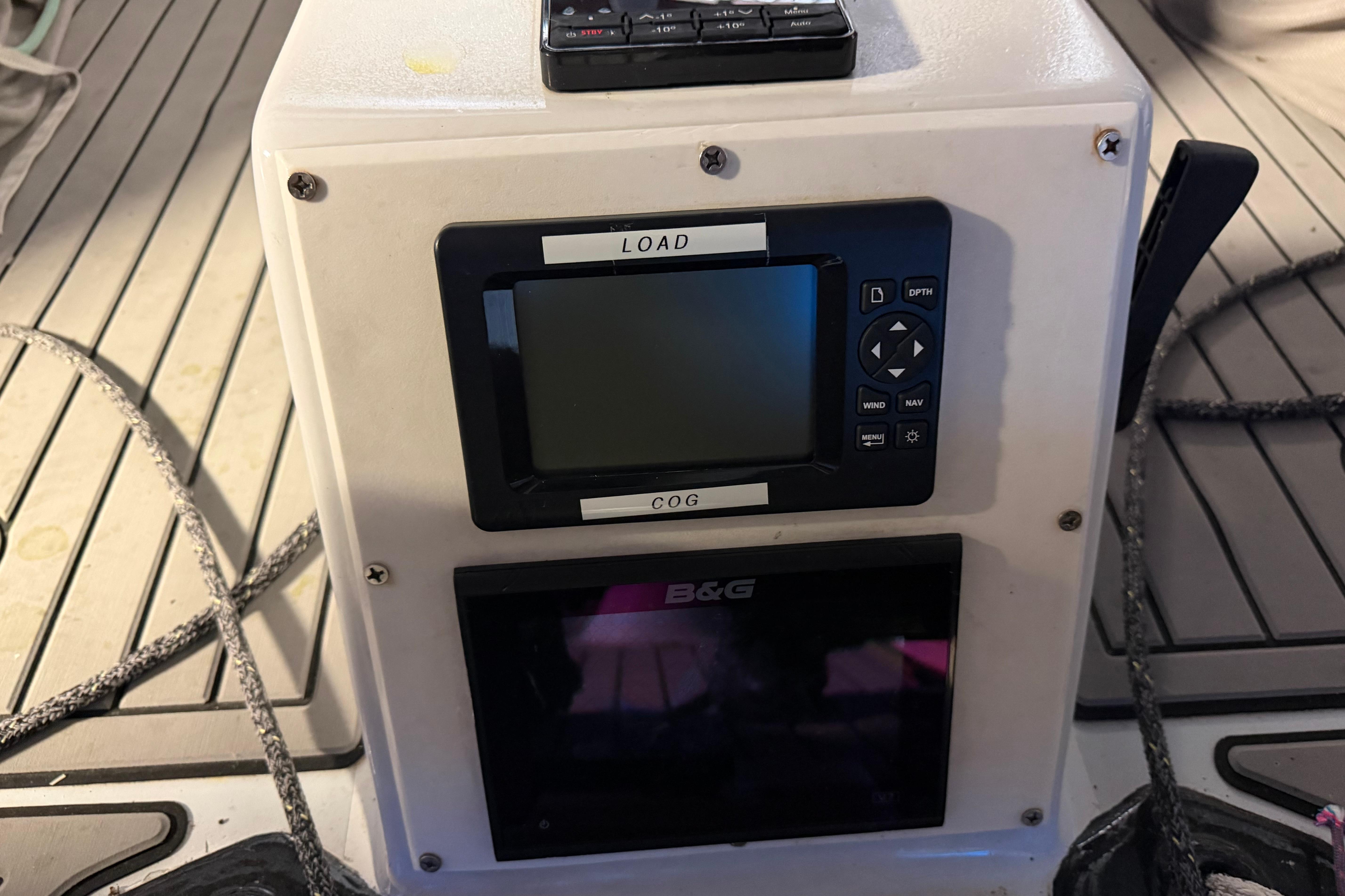 Boat navigation equipment on Andrews 63, featuring B&G displays and control panel.