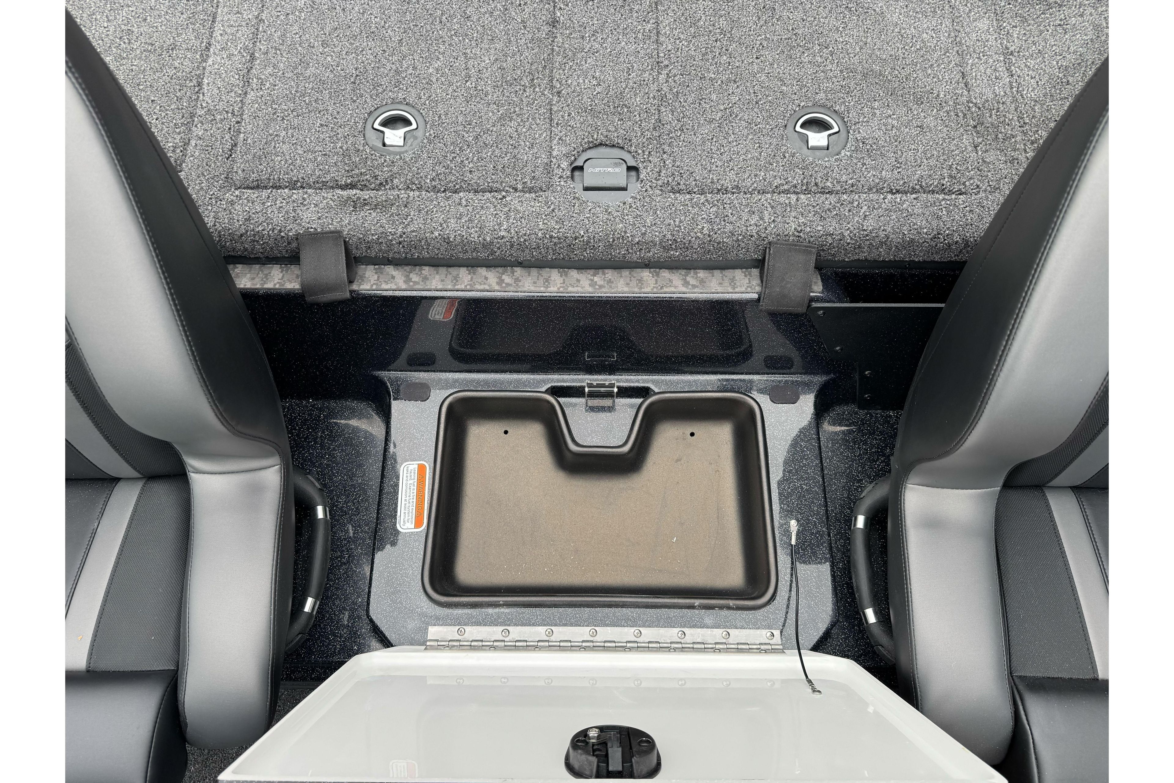 Interior view of 2026 Nitro Z20 XL Pro boat with storage compartment.