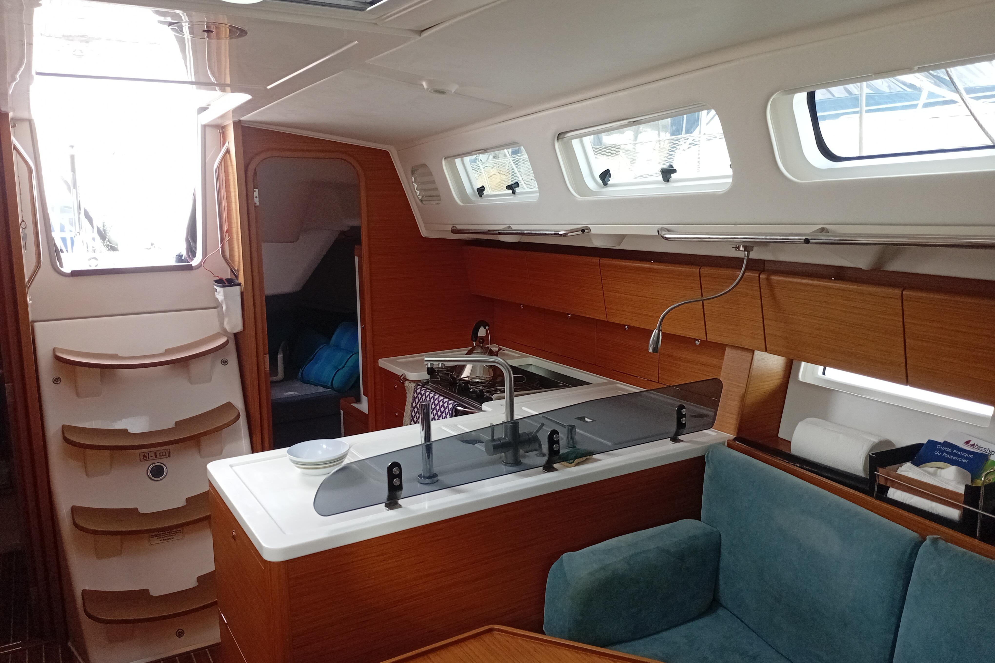 Interior of 2016 X-Yachts Xp 38 sailboat with modern kitchen and seating area.