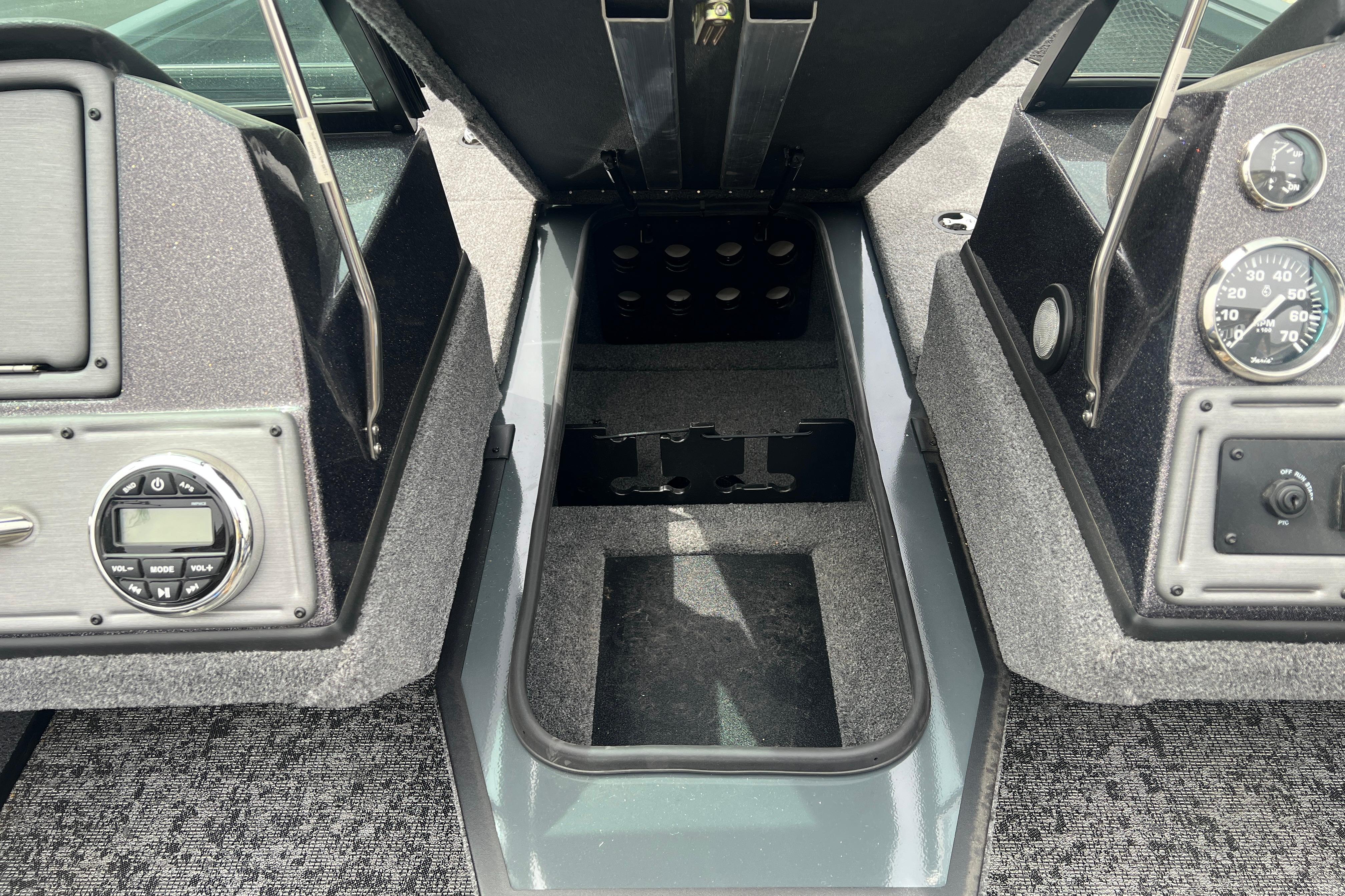2026 Ranger VS1682SC Angler boat dashboard with storage compartment and control panel.