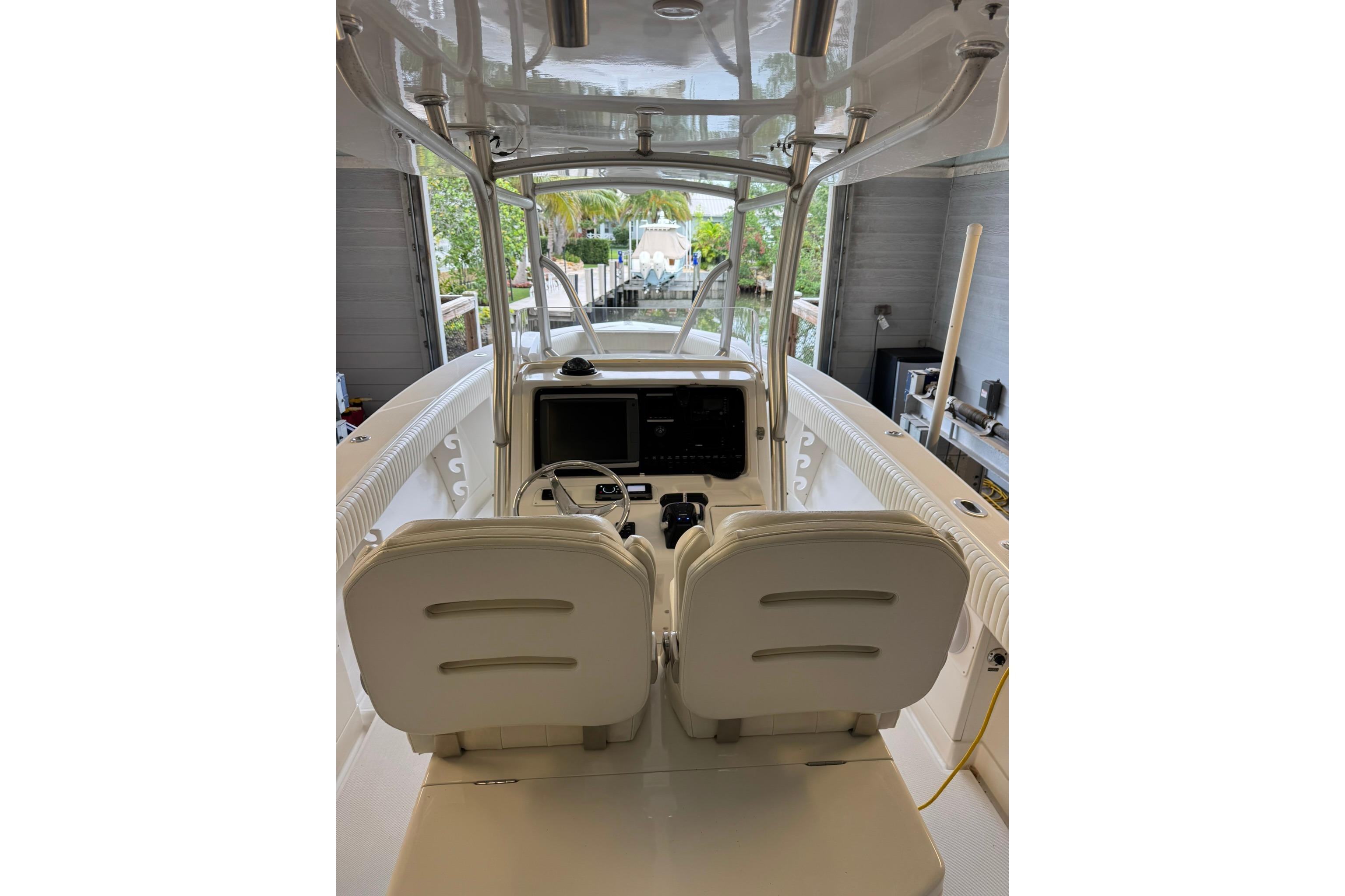 2007 Jupiter 29 FS boat interior with dual seats and navigation console.