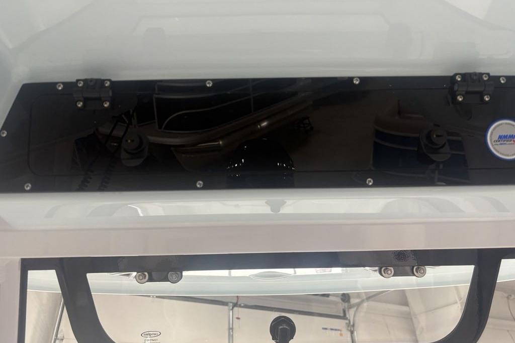 2026 Sportsman Masters 227 boat interior detail with control panel and equipment.