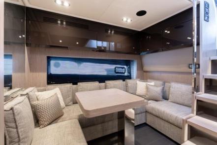 Luxurious interior of 2019 Azimut Atlantis 51 yacht with modern seating and elegant decor.