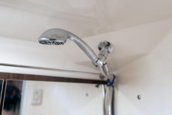 Showerhead in 2016 Regal 28 Express boat interior, chrome finish, modern design.