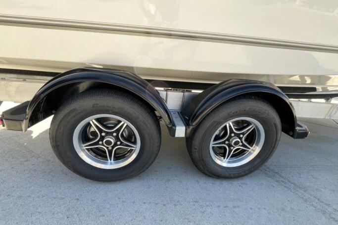 Trailer wheels of a 2025 Mako 214 Center Console boat.