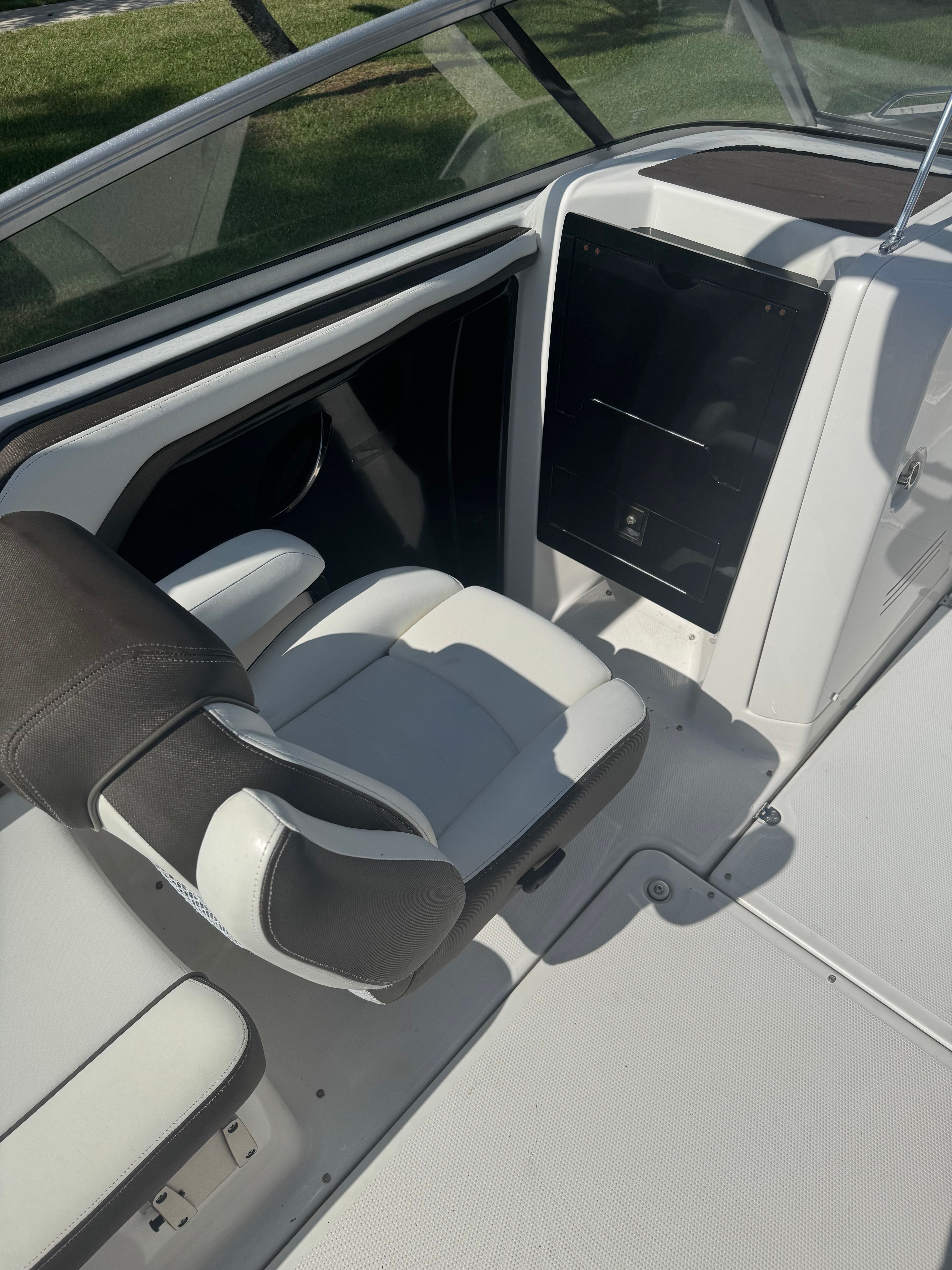A sleek seating area on a 2015 Yamaha 242 Limited S boat.