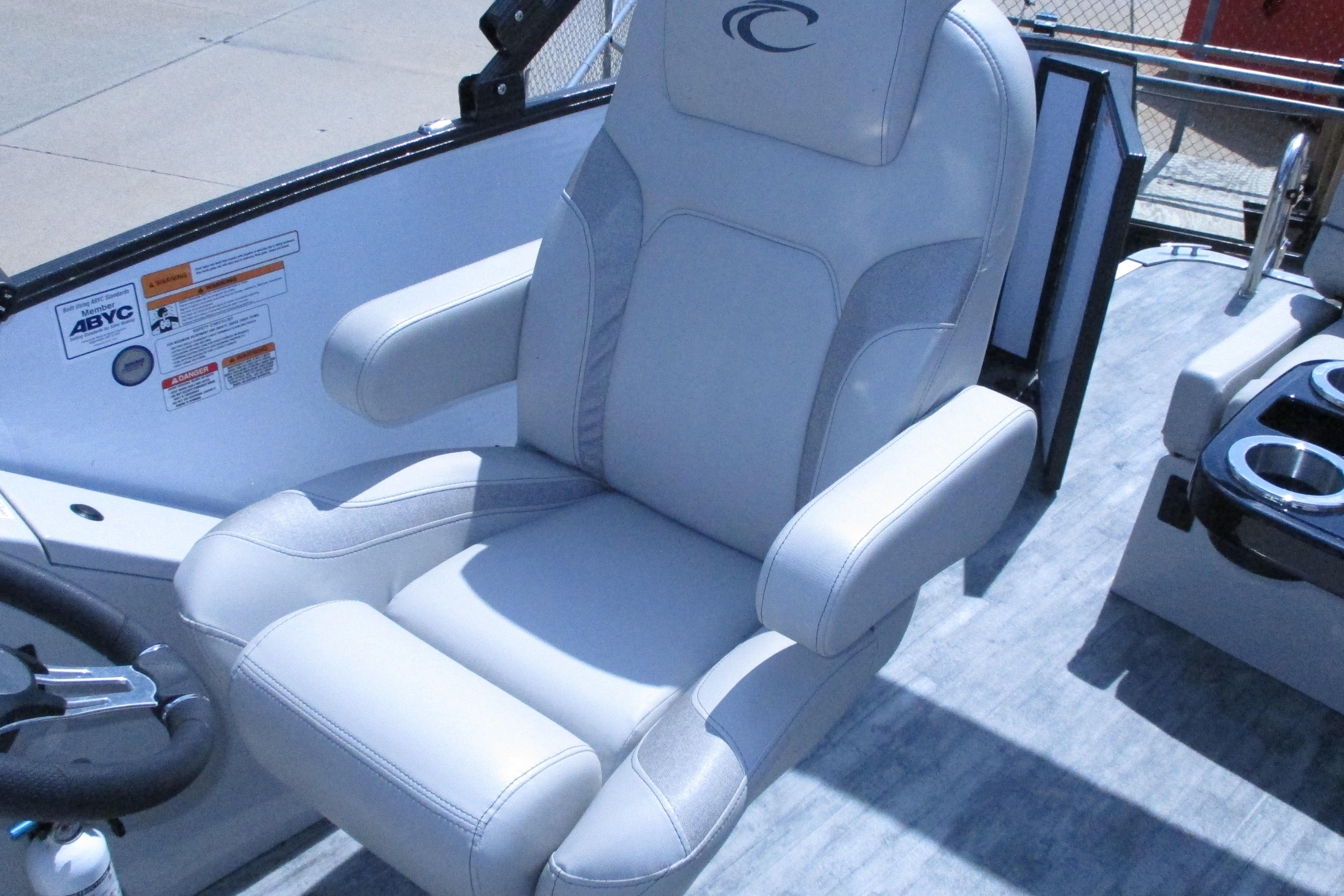 Captain's chair in 2021 Crest Caribbean LX 250 SLS boat, featuring sleek design and comfortable seating.