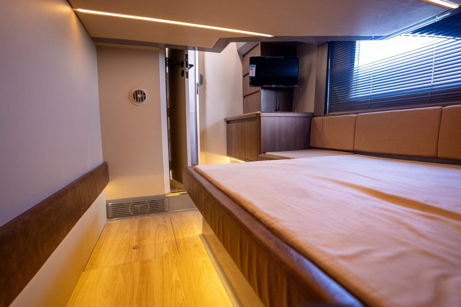 Luxurious interior of 2026 Hanover 447 yacht with modern furnishings and ambient lighting.