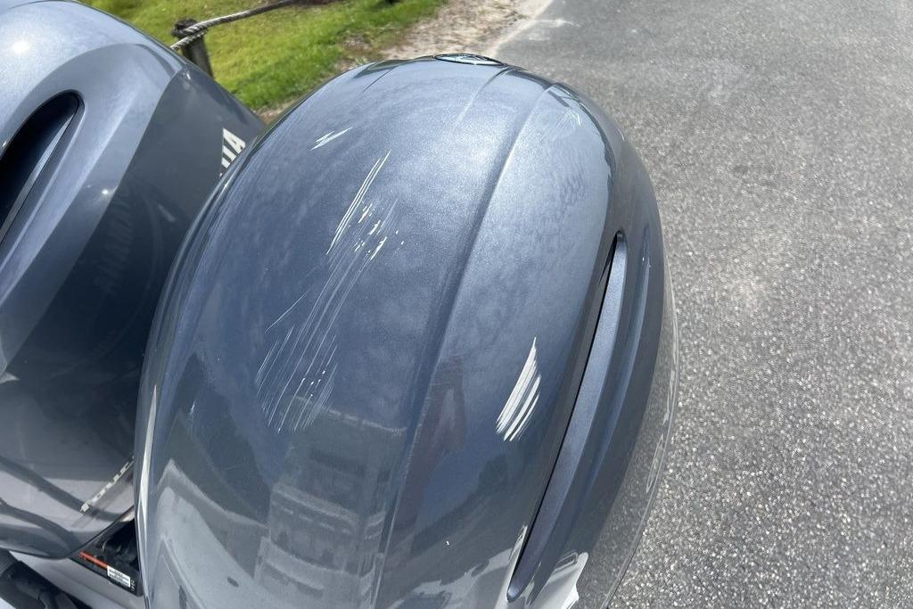Scratched outboard motor on 2021 Sea Hunt Gamefish 25 boat.