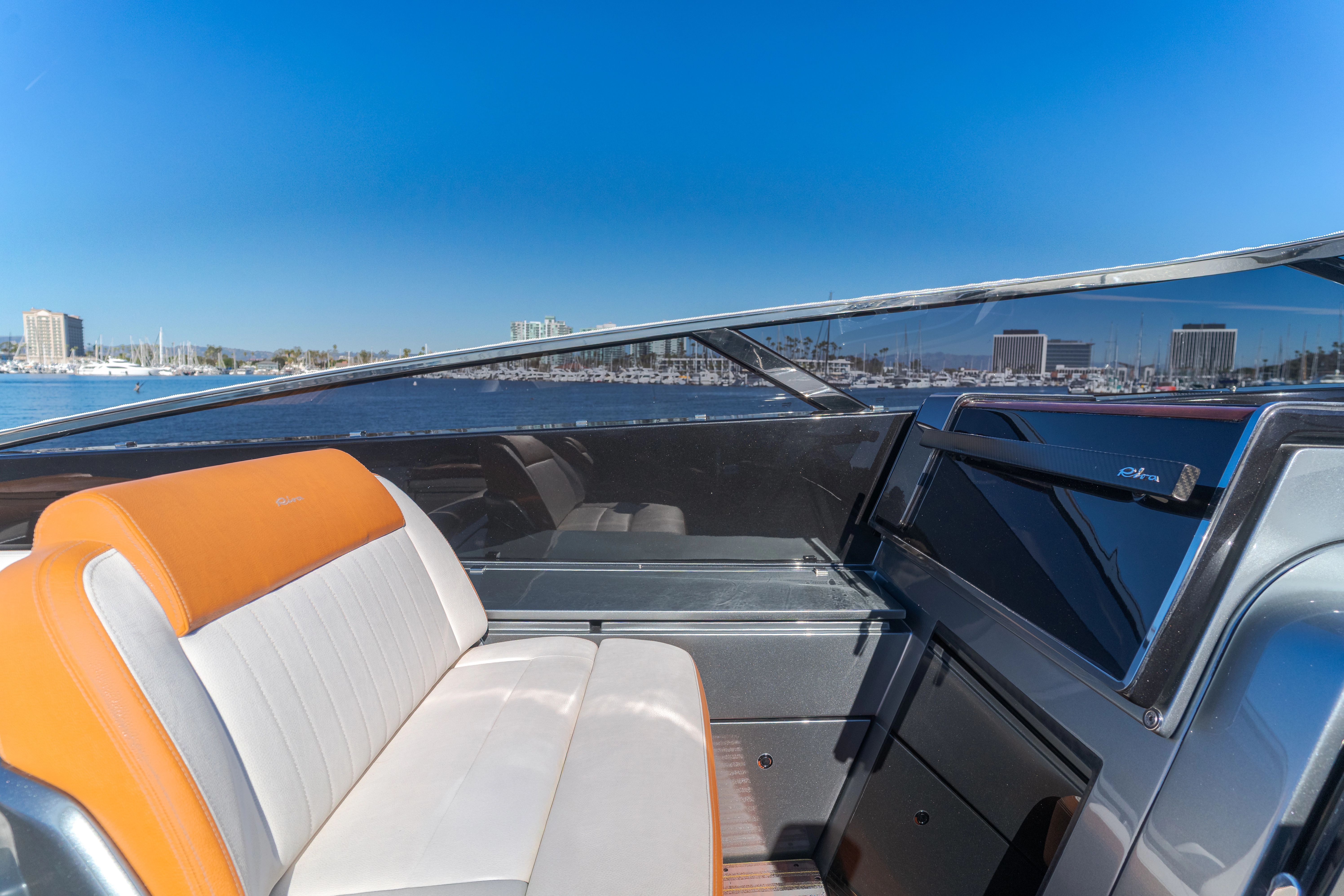 Interior of 2021 Riva 48' Dolceriva yacht with luxurious seating area.