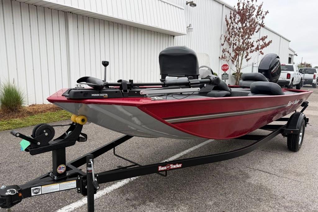 2026 Tracker Bass Tracker Classic XL boat on trailer, red exterior, parked outdoors.