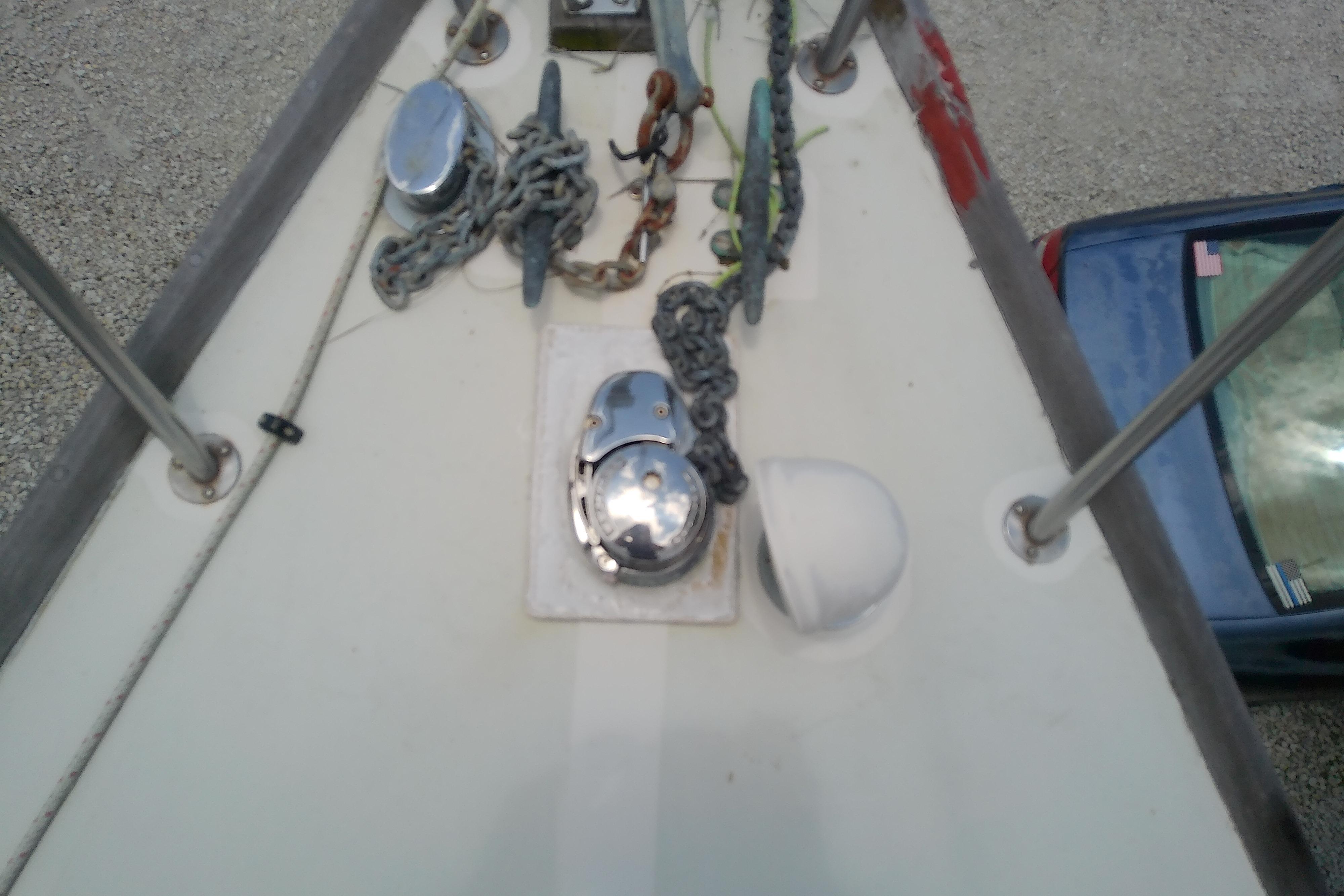 Anchor chain and winch on 1981 Sea Sprite 34 sailboat deck.