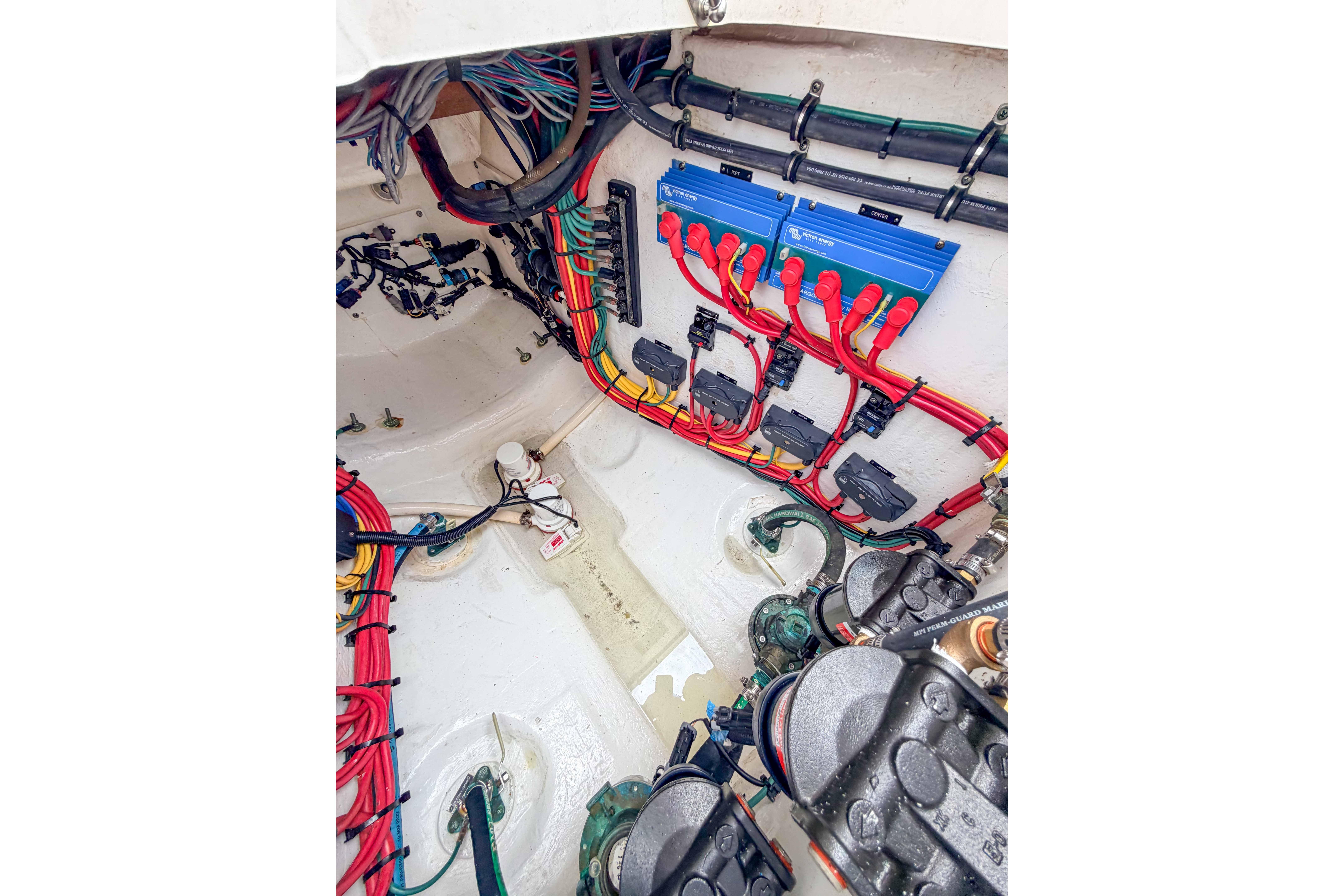 Engine compartment of 2021 Intrepid 409 Valor with wiring and components visible.