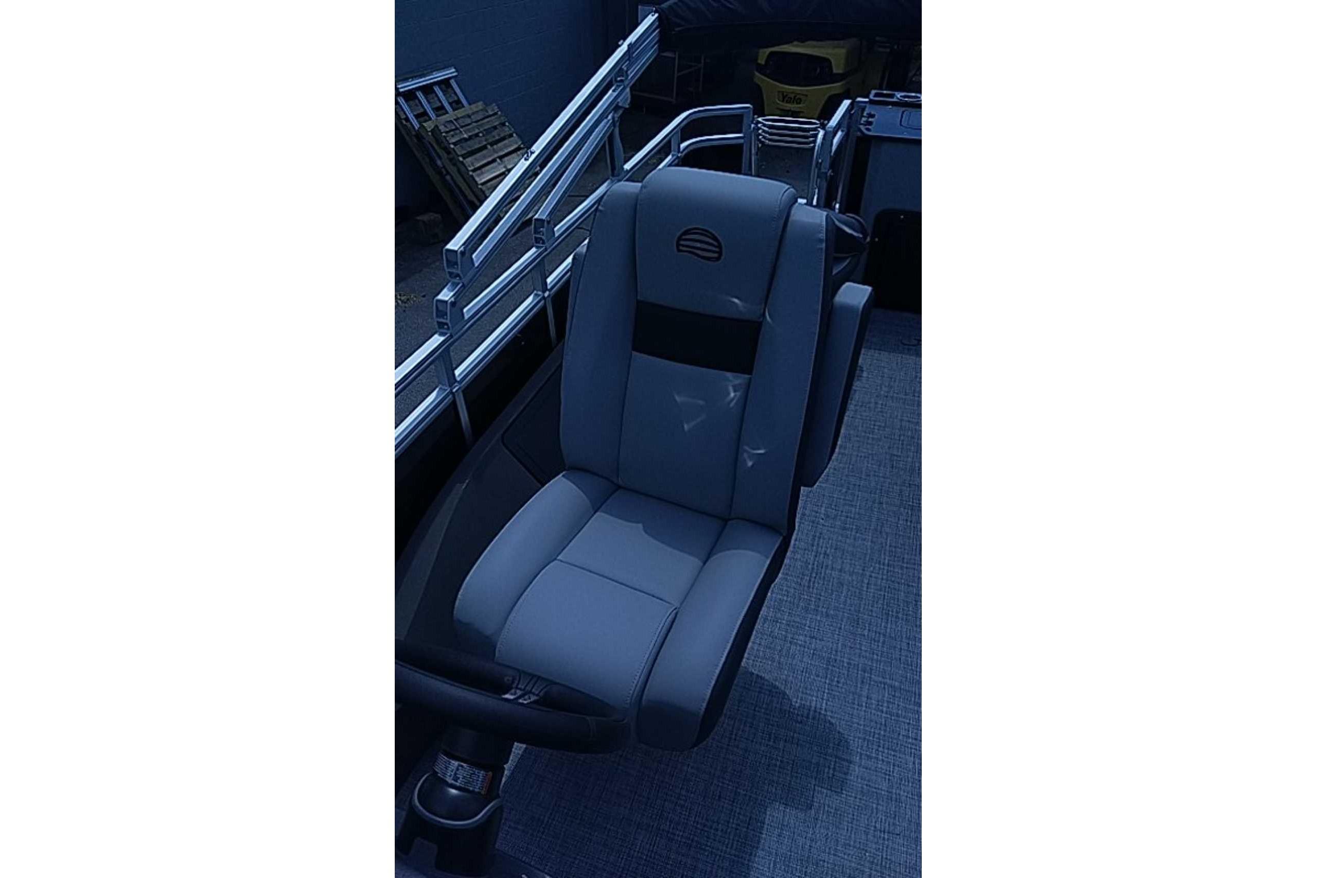 2026 Sun Tracker SportFish 22 DLX boat seat, featuring sleek gray upholstery.