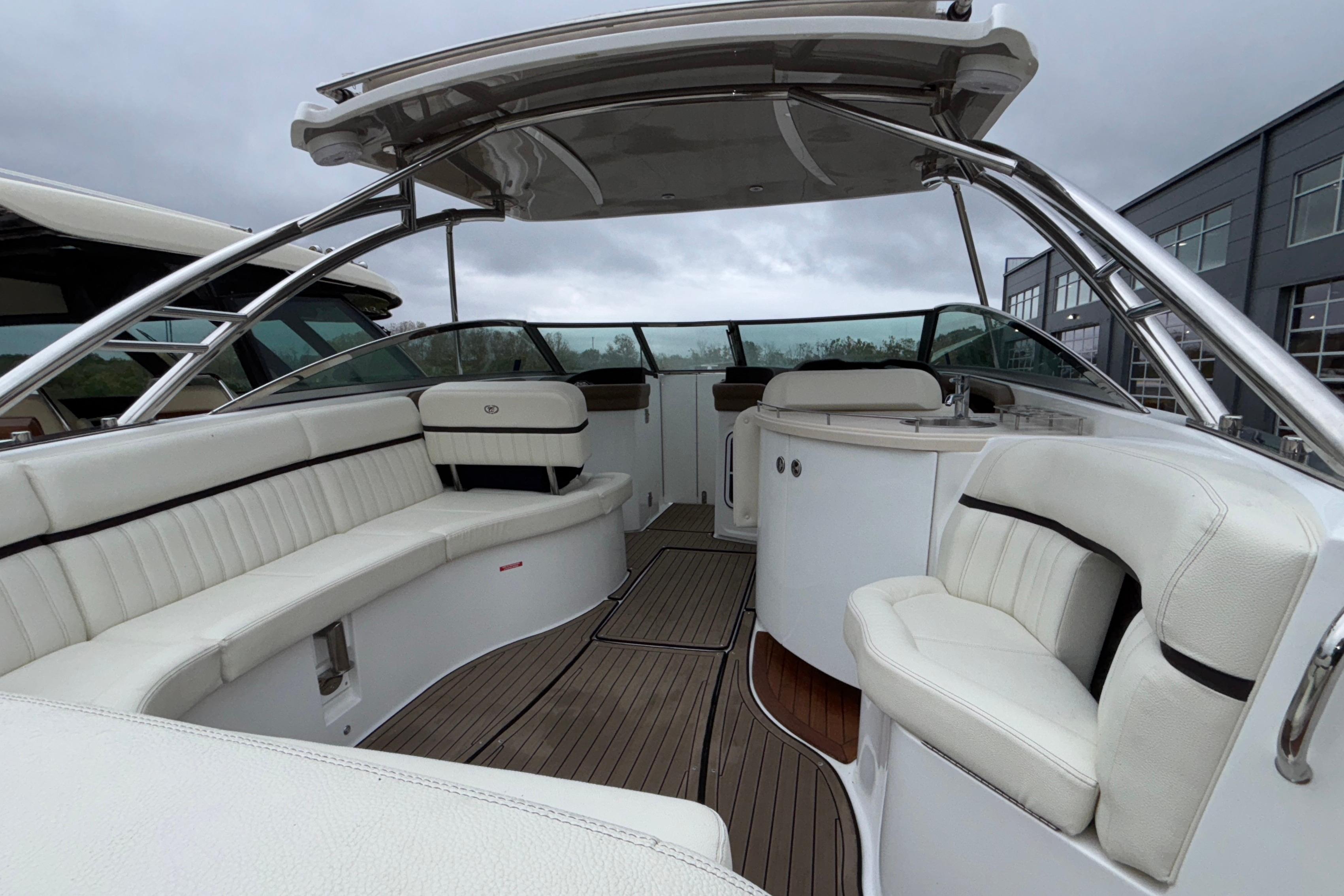 Luxurious 2022 Cobalt R35 boat interior with white seating and sleek design.
