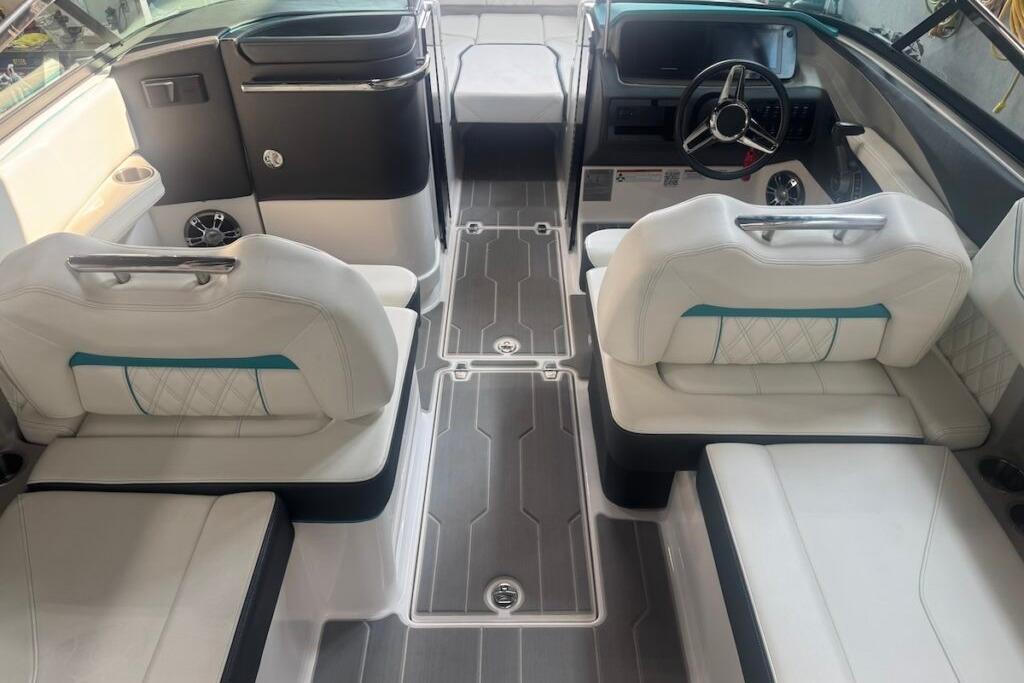 2022 Regal LS6 Surf boat interior with modern seating and sleek dashboard design.