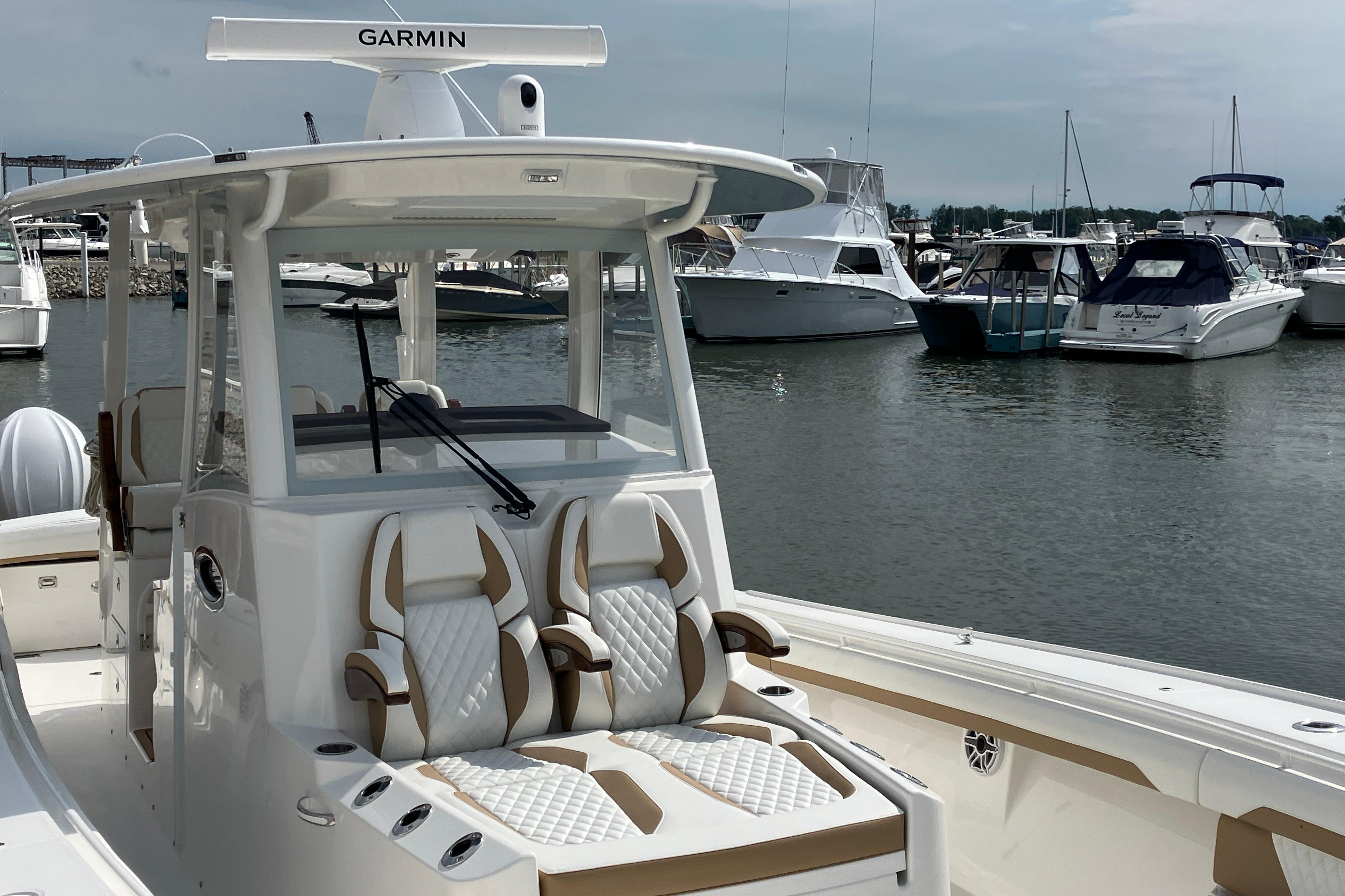 2027 Regulator 35 boat with Garmin equipment docked in a marina.