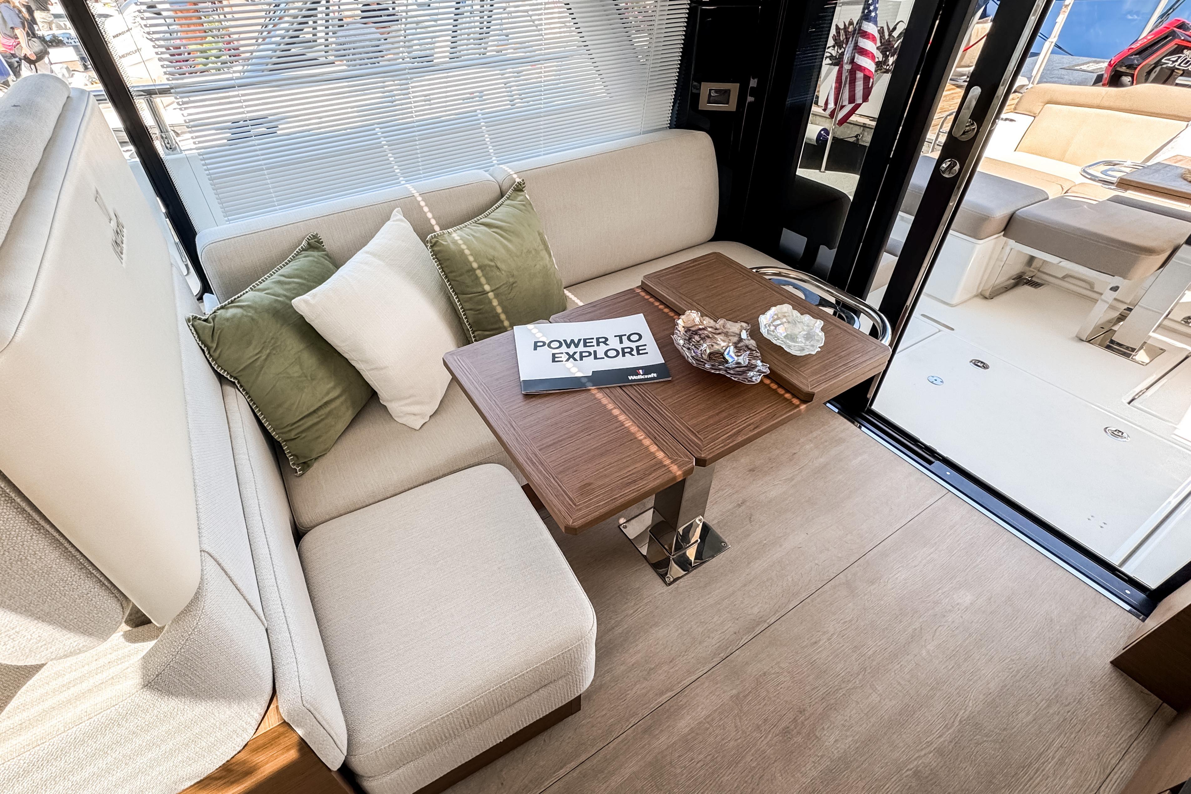 Interior of 2026 Wellcraft 44 Explorer with cozy seating area.