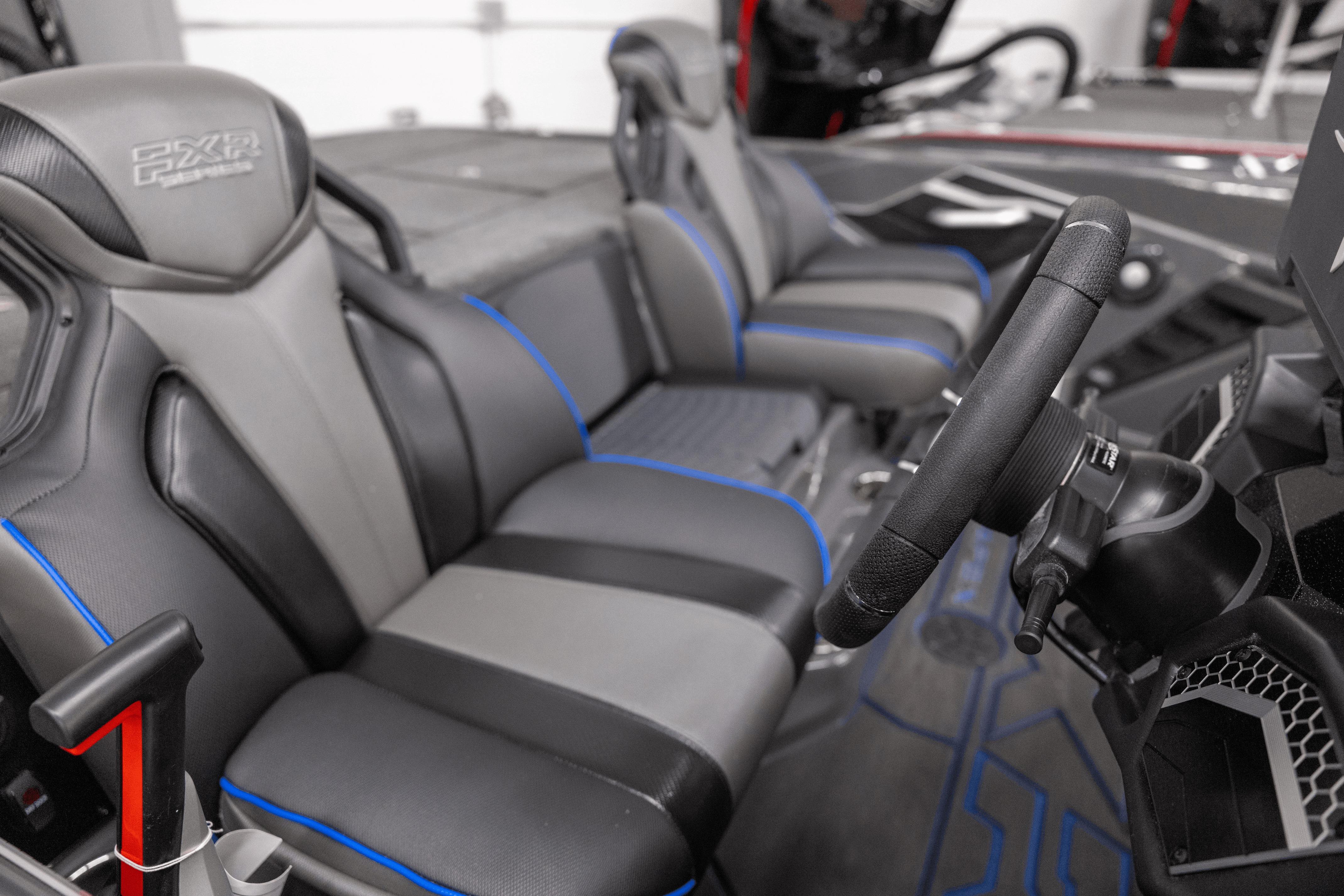 2026 Skeeter FXR20 Apex boat interior with sleek seats and modern steering wheel design.