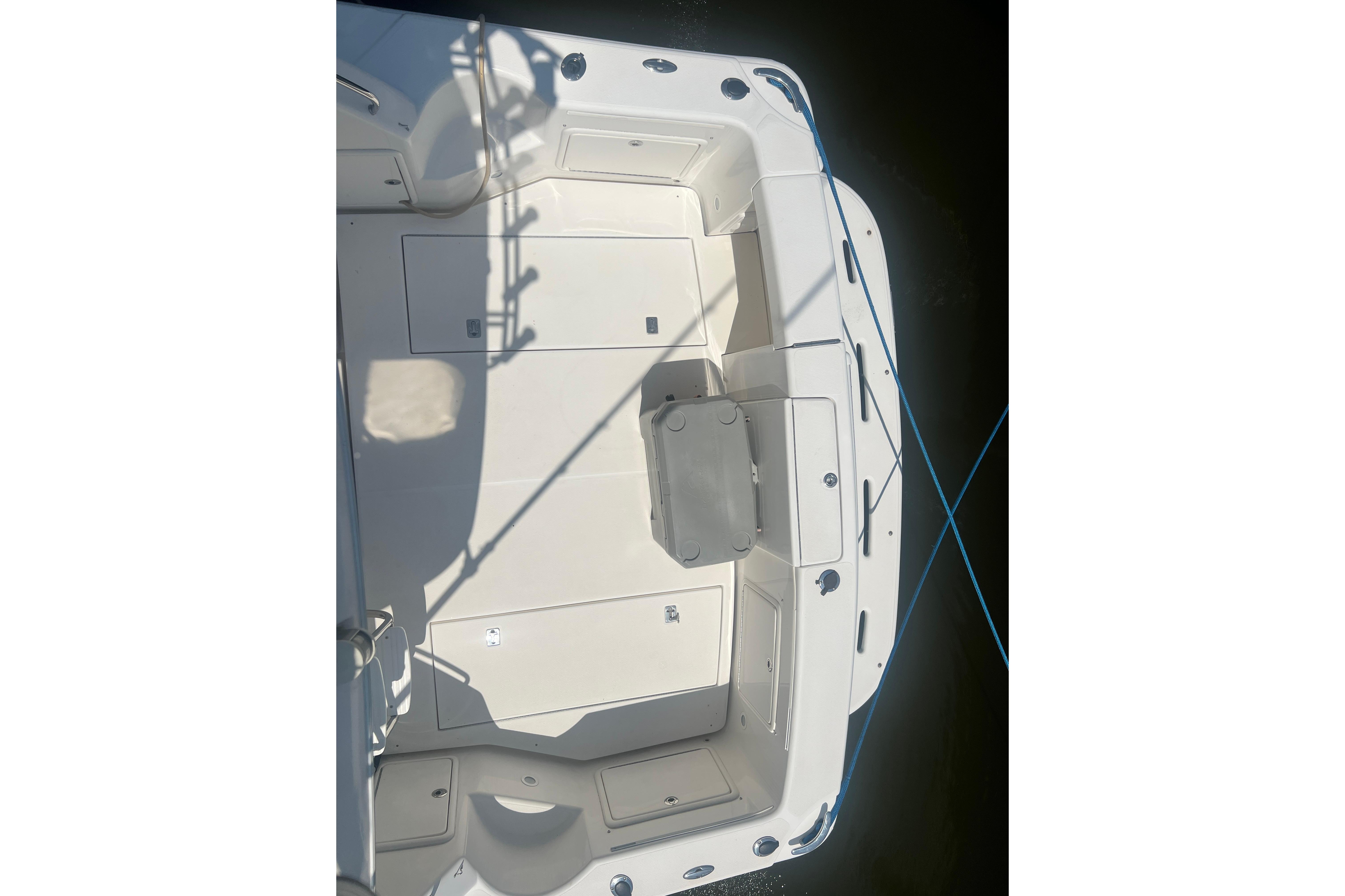 2007 Riviera 33 Flybridge boat deck with seating and storage compartments.
