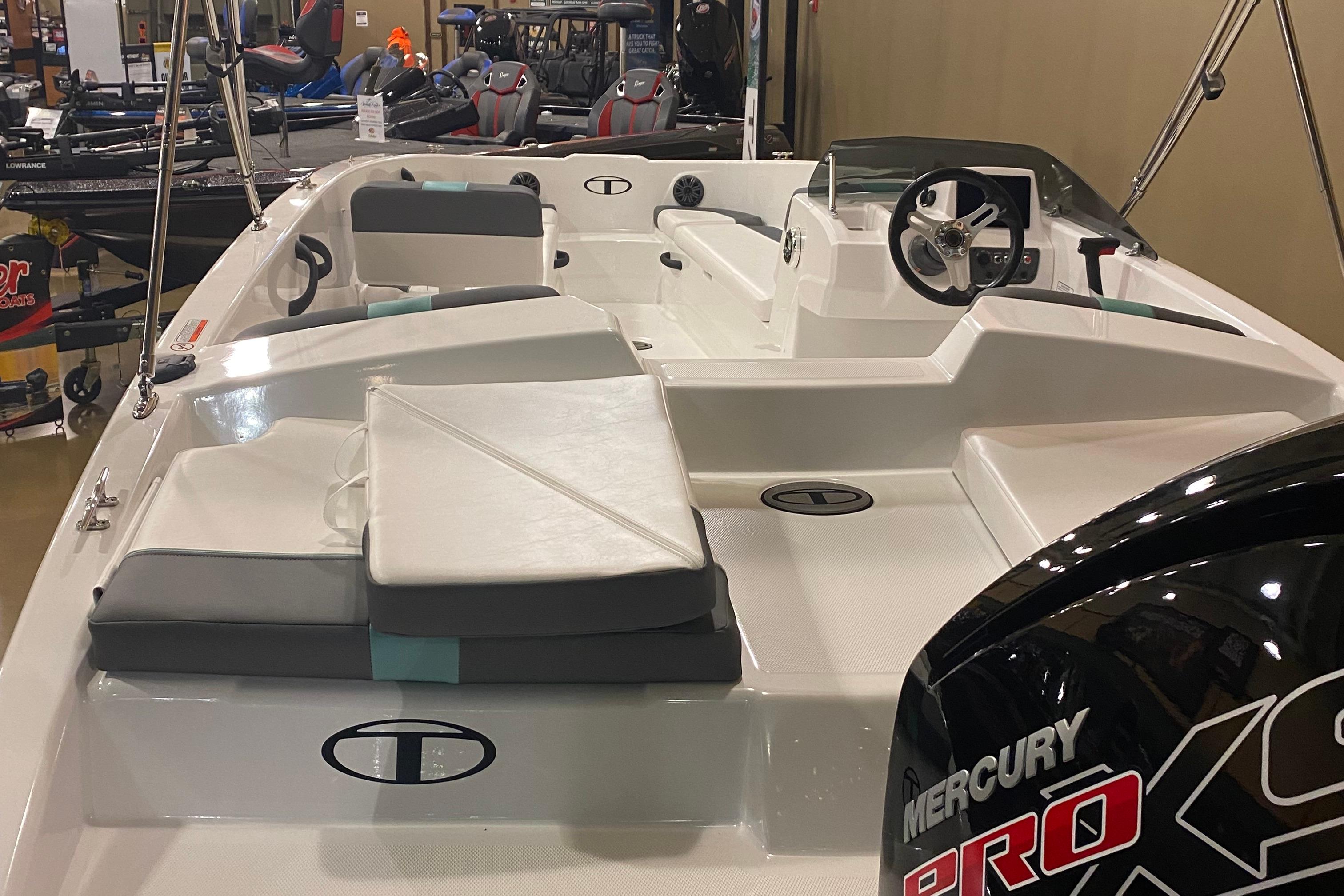 2026 Tahoe T18 boat interior with seating and Mercury Pro XS engine.