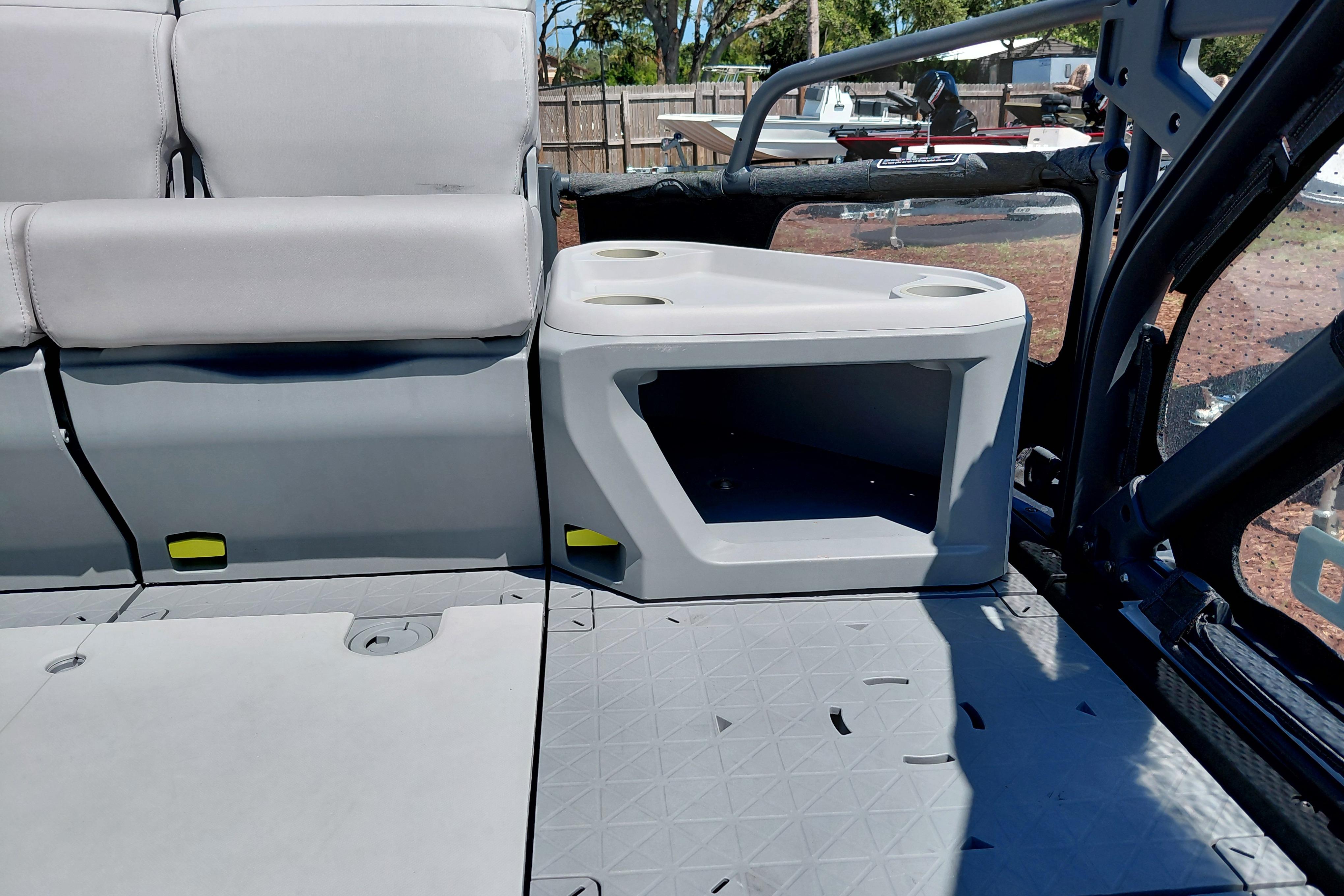 2024 Sea-Doo Switch Cruise 18 interior seating with storage and cup holders.