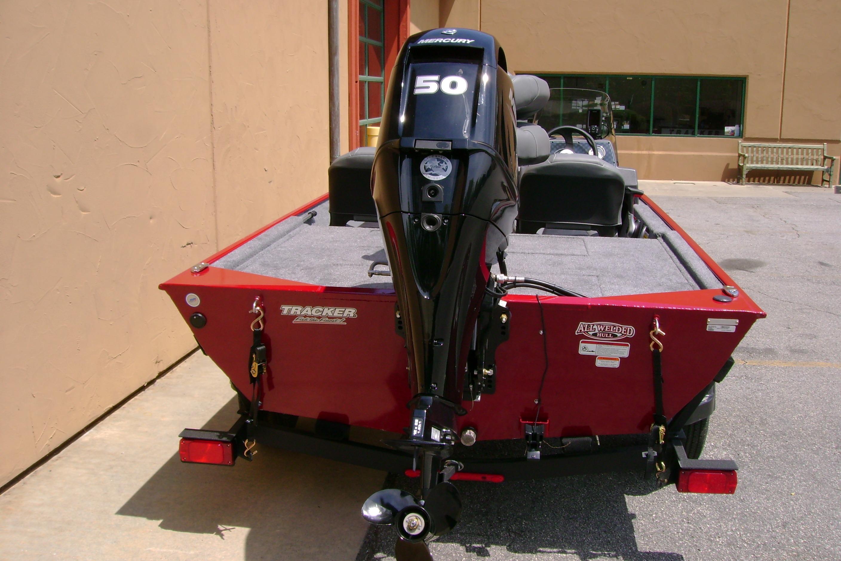 2026 Tracker Bass Tracker Classic XL boat with Mercury 50 engine, parked outdoors.