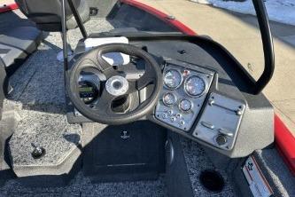2026 Tracker Pro Guide V-175 Combo boat dashboard with steering wheel and instrument panel.