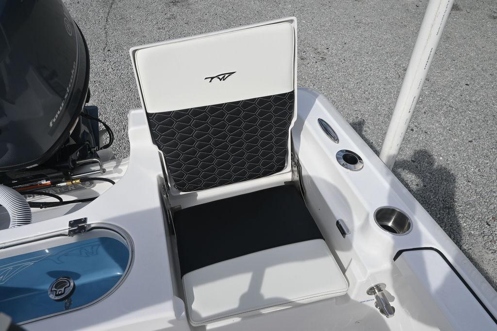 2026 Tidewater 1910 Bay Max boat seat with black and white design, featuring cup holders.