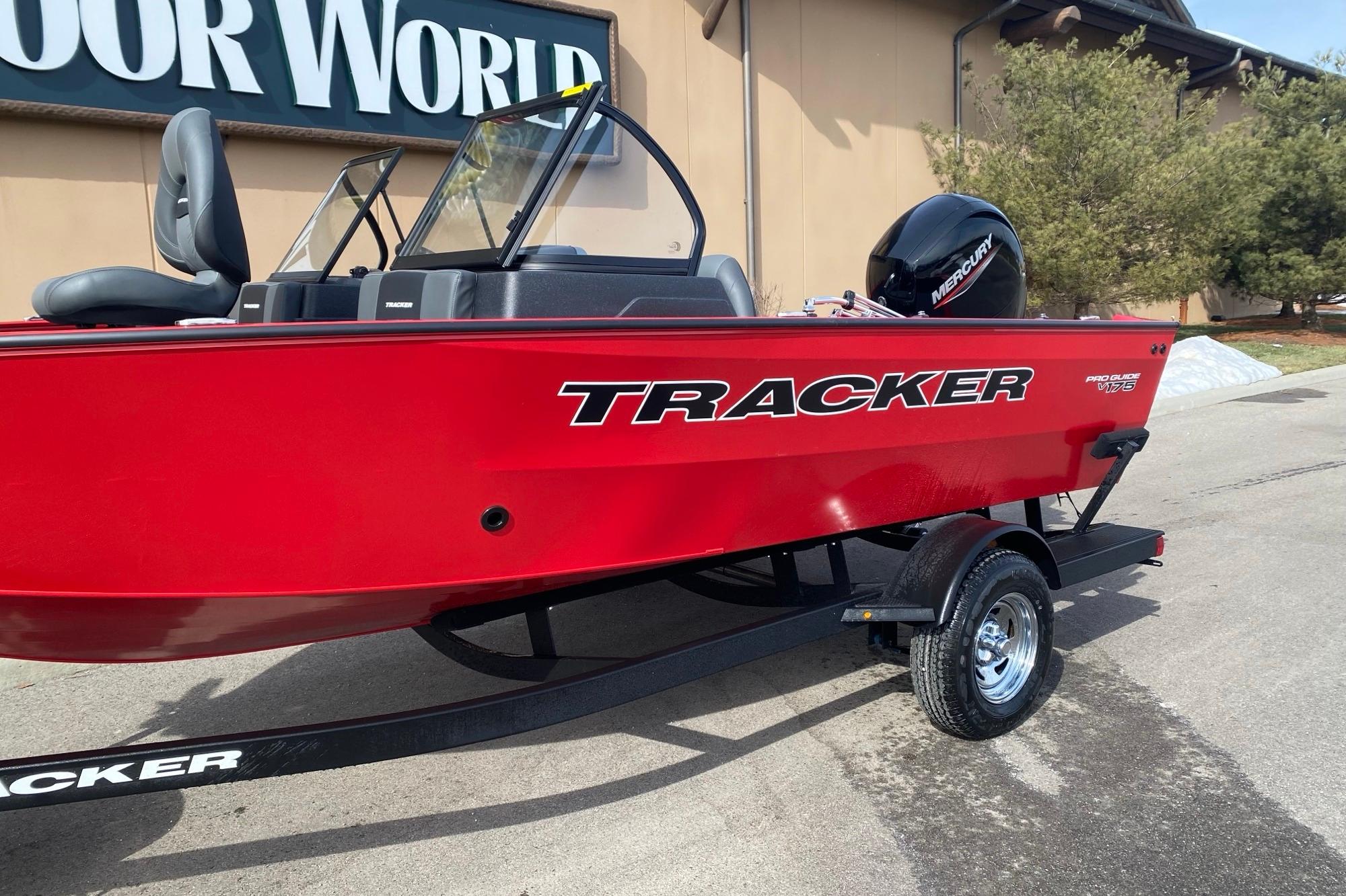 2026 Tracker Pro Guide V-175 Combo boat, red exterior, displayed outdoors.