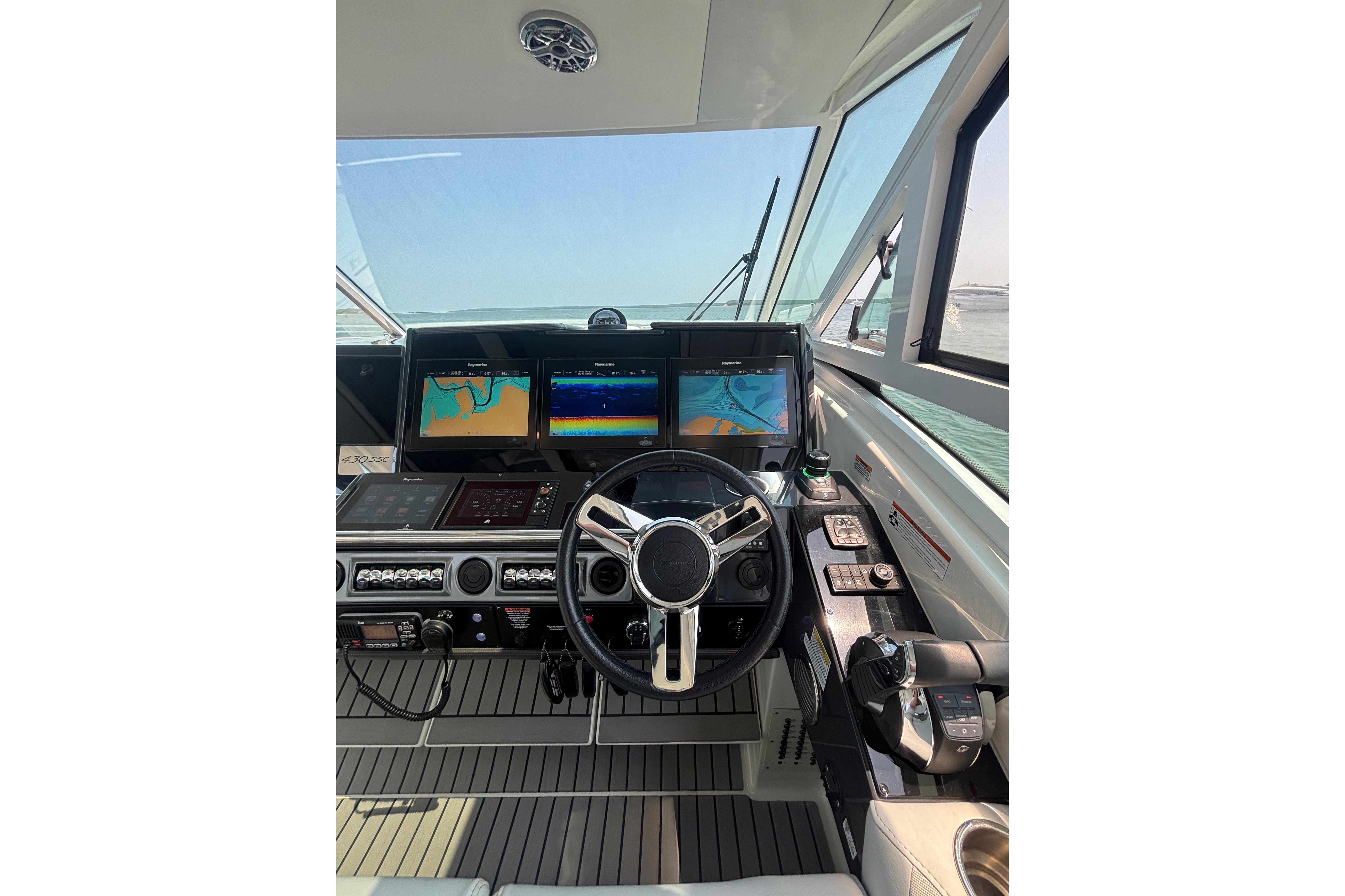 Cockpit of 2019 Formula 430 Super Sport Crossover with advanced navigation displays.