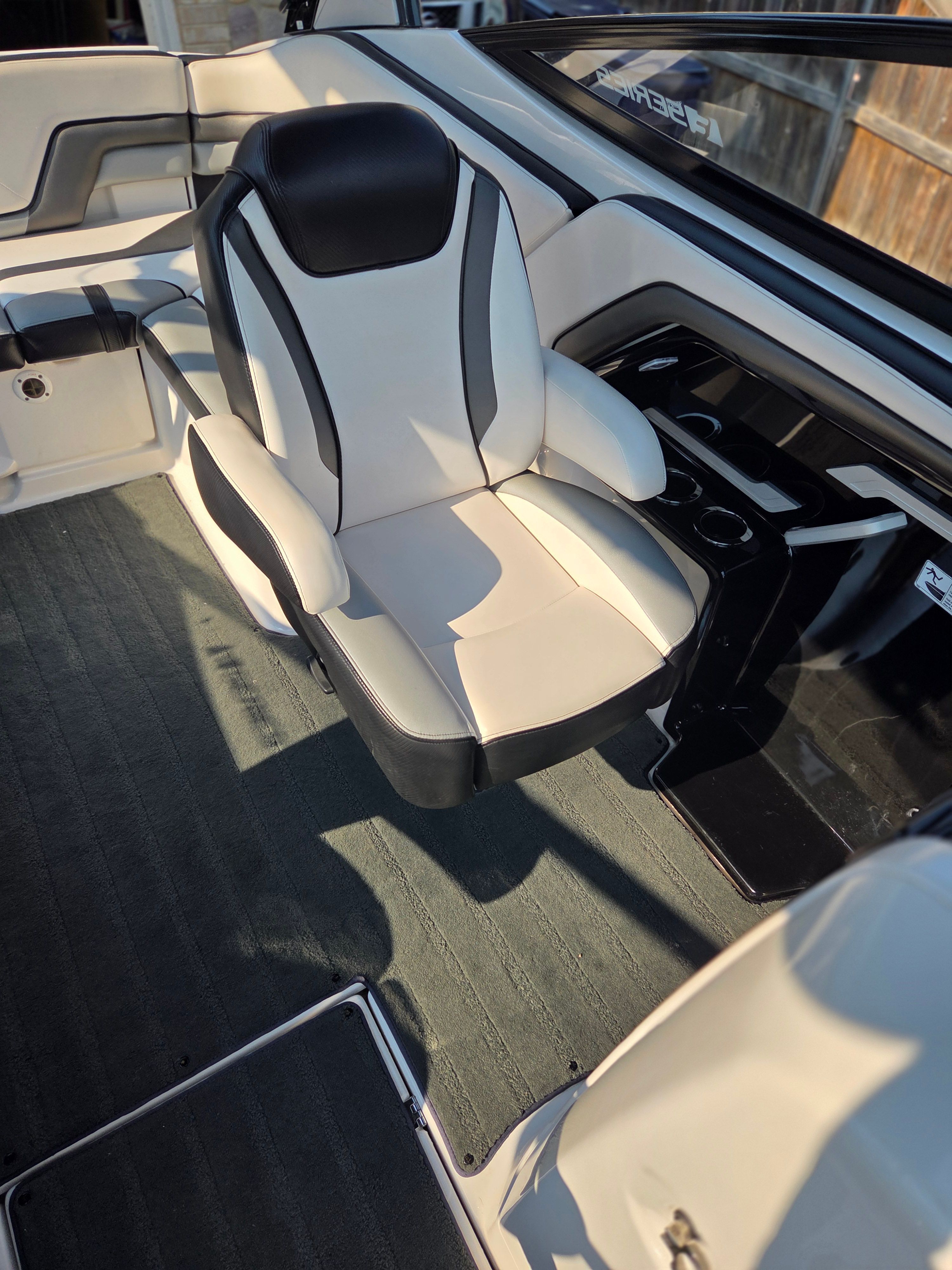 A sleek seat in the cockpit of a 2016 Yamaha 242X E-Series boat.