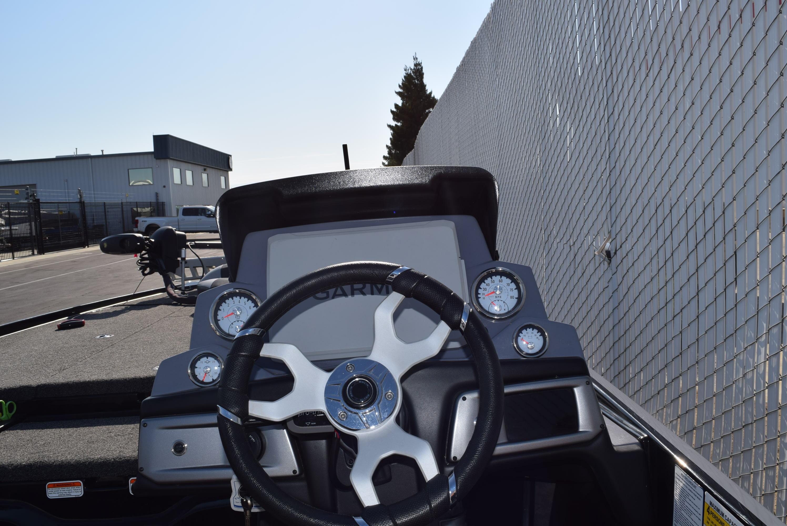 2025 Nitro Z20 XL Pro boat dashboard with steering wheel and gauges.