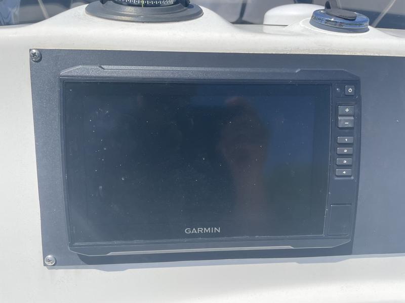 Garmin navigation display on 2006 Boston Whaler 210 Outrage boat dashboard.
