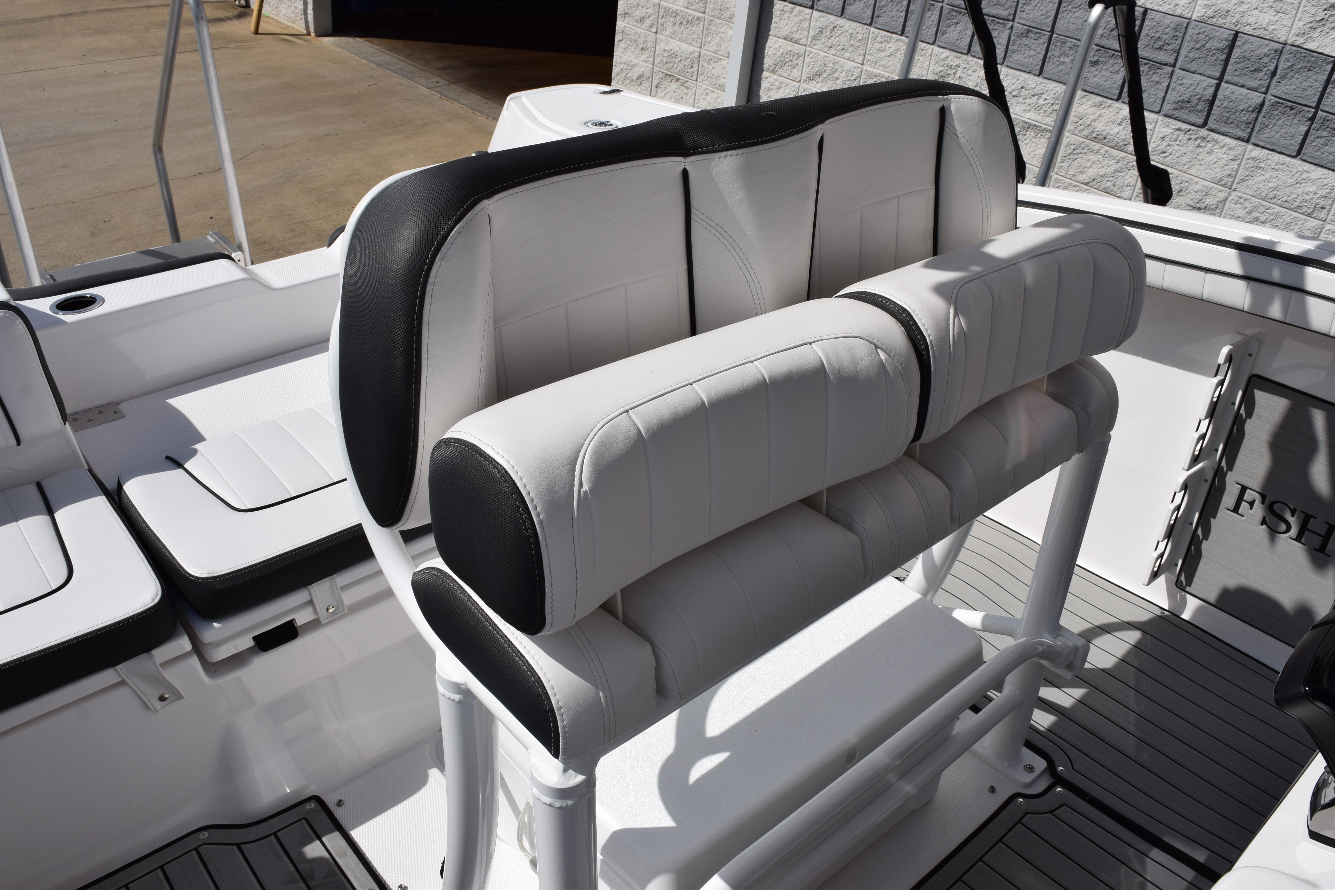 2026 Yamaha Boats 255 FSH Sport H interior seating with white and black upholstery.