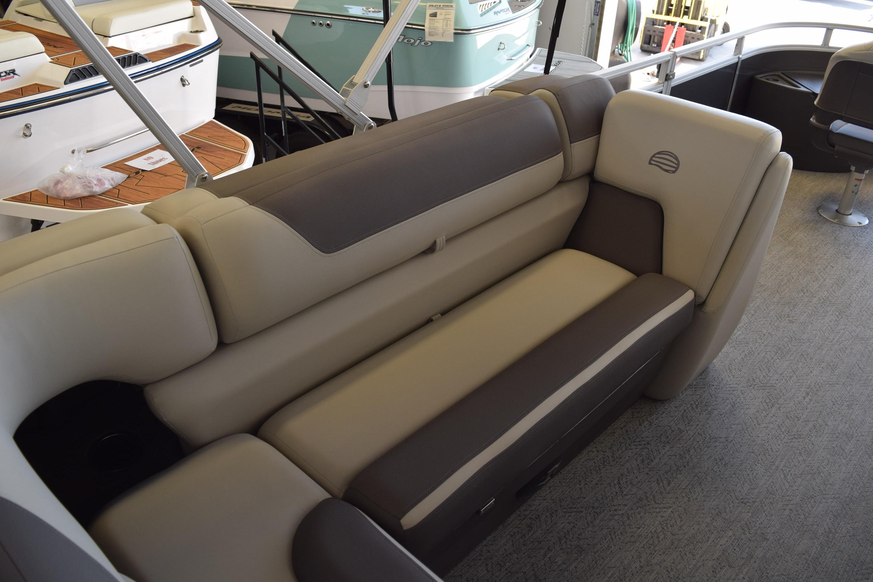 Luxurious seating on 2026 Sun Tracker Fishin' Barge 22 DLX pontoon boat.