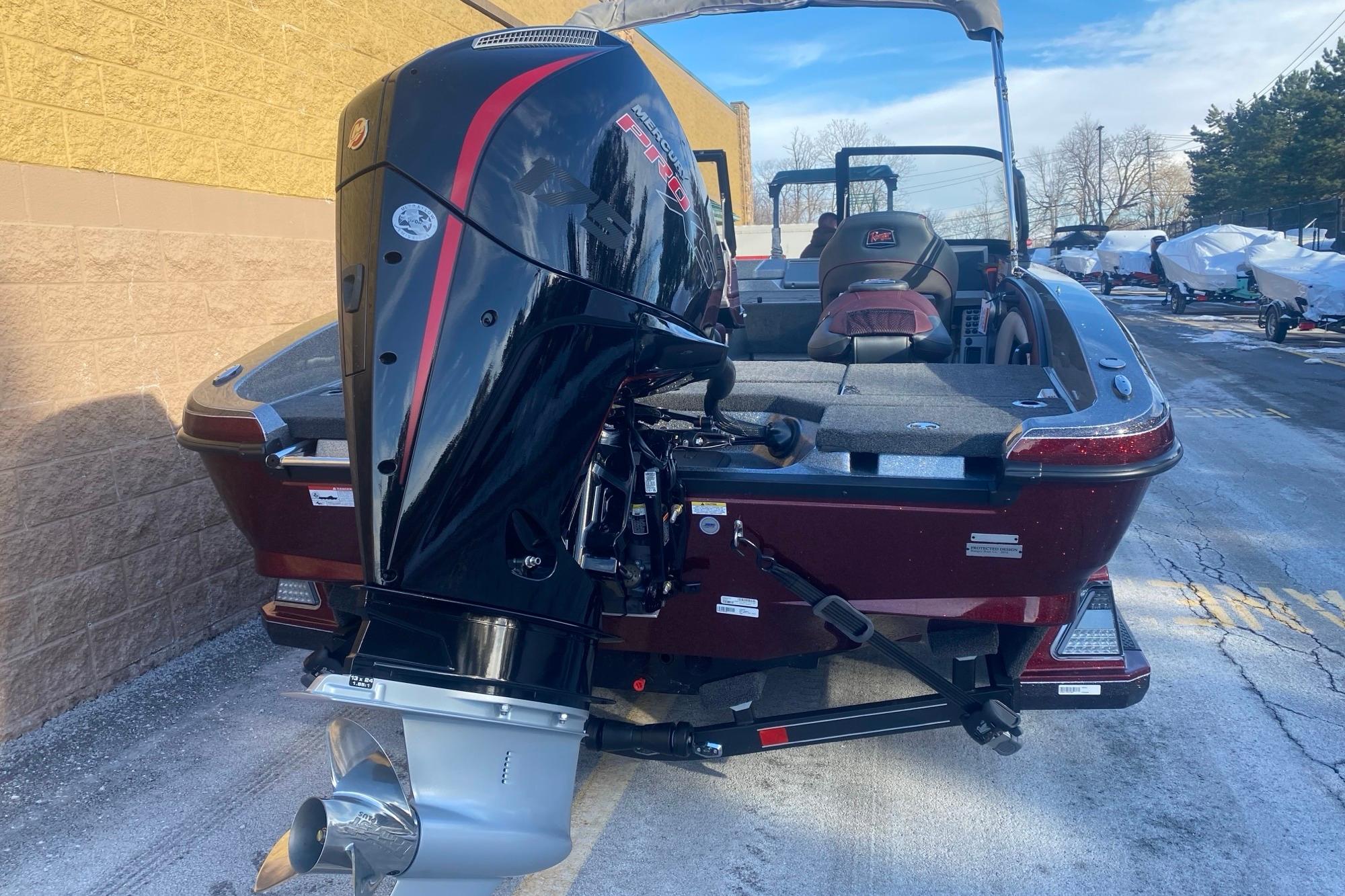 2026 Ranger 1850MS boat with powerful outboard motor, parked outdoors.