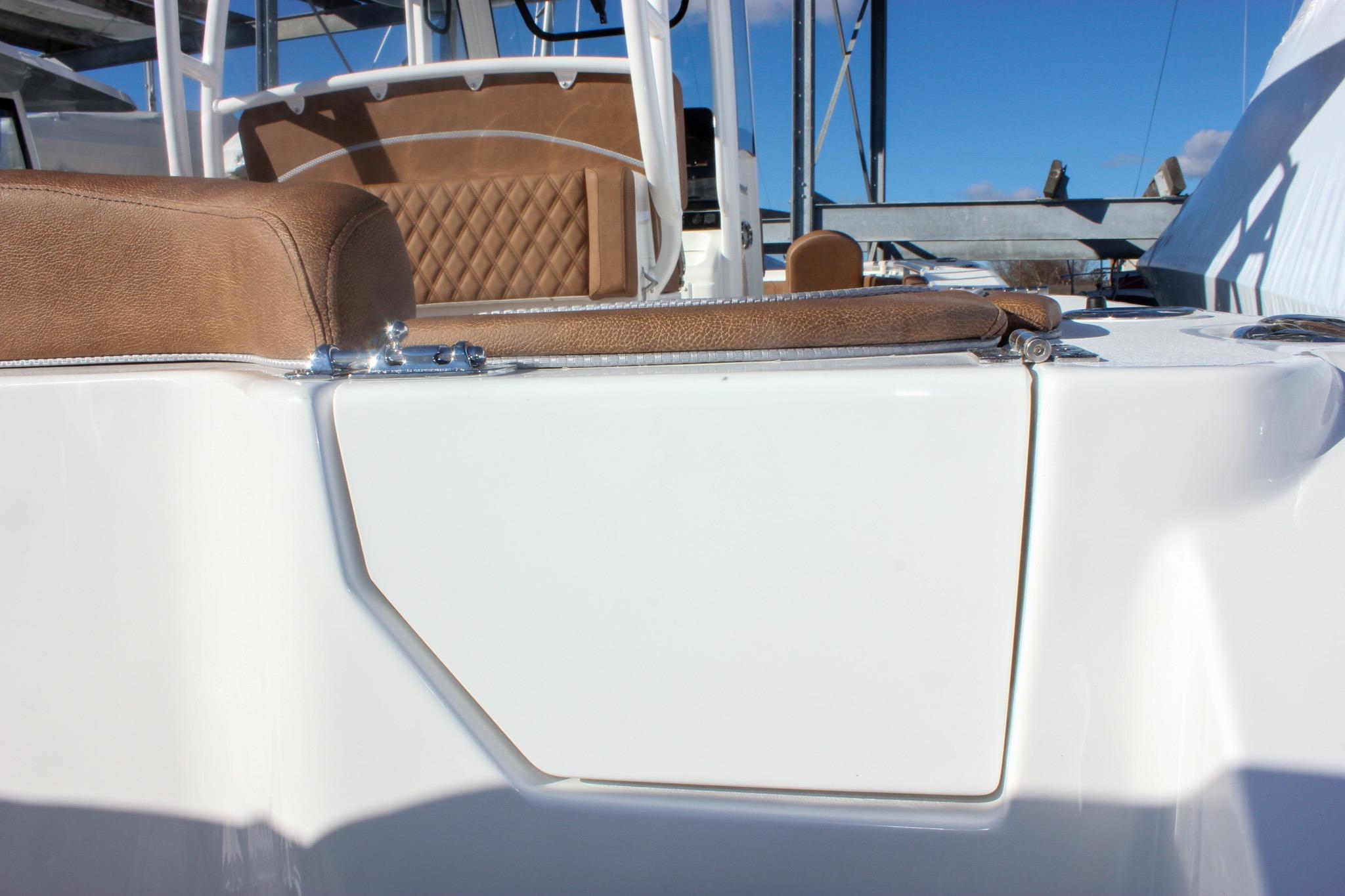 2026 Sea Hunt Ultra 285 SE boat with brown seating and white exterior.
