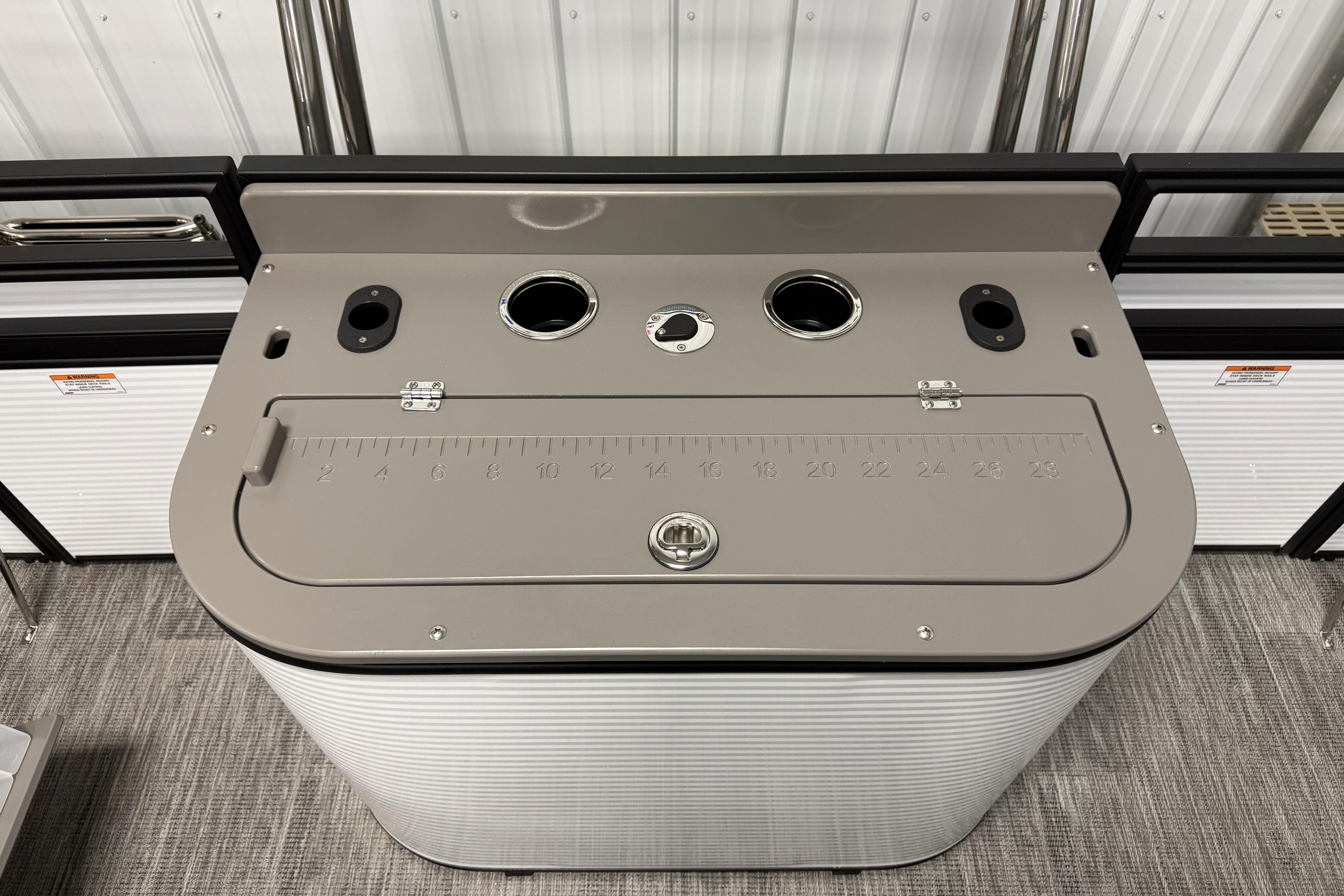 2026 Qwest M-Class 22 Pro Sport boat console with integrated ruler and cup holders.
