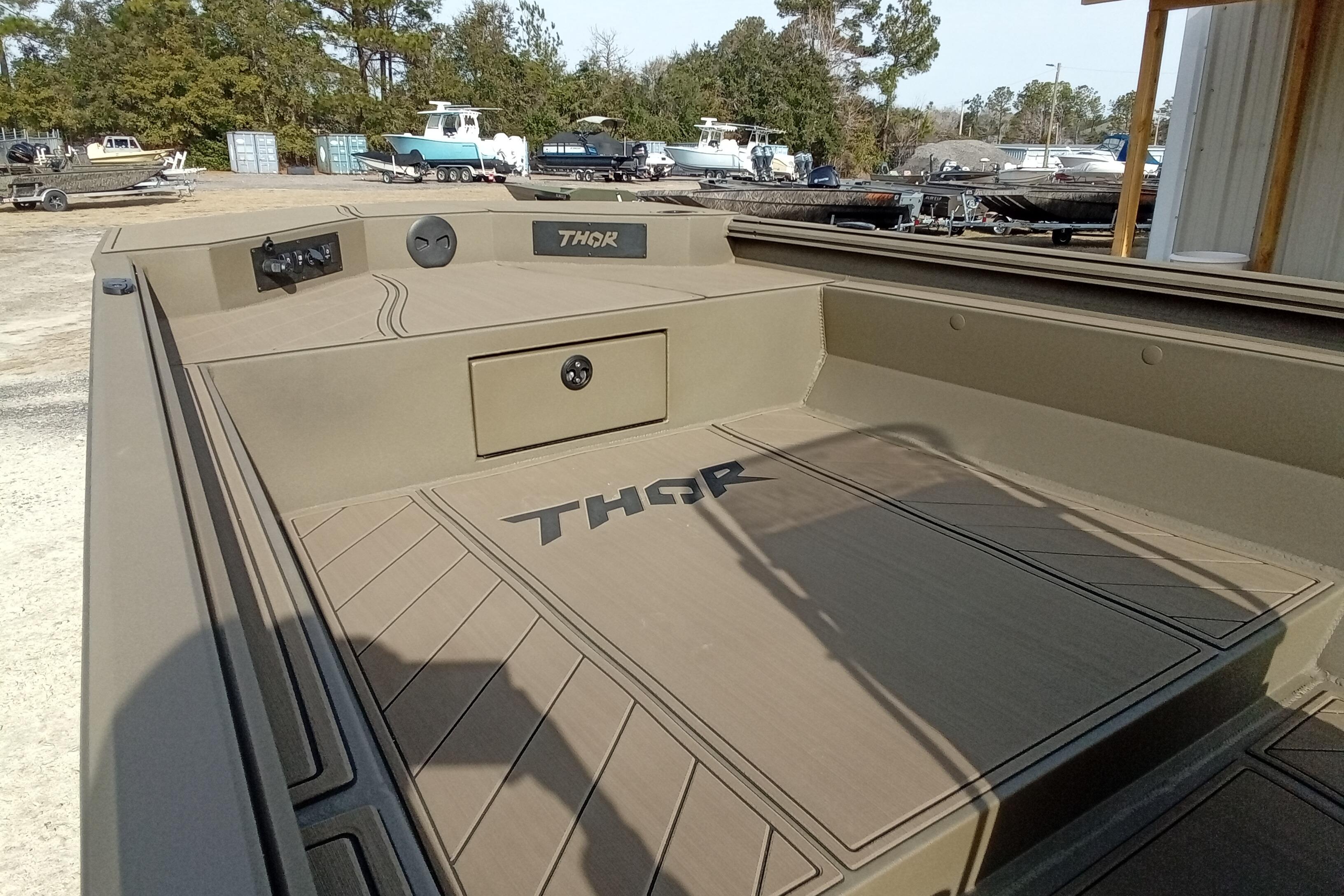 2026 Thor 1900 Low Country Elite boat interior, featuring spacious deck and storage.