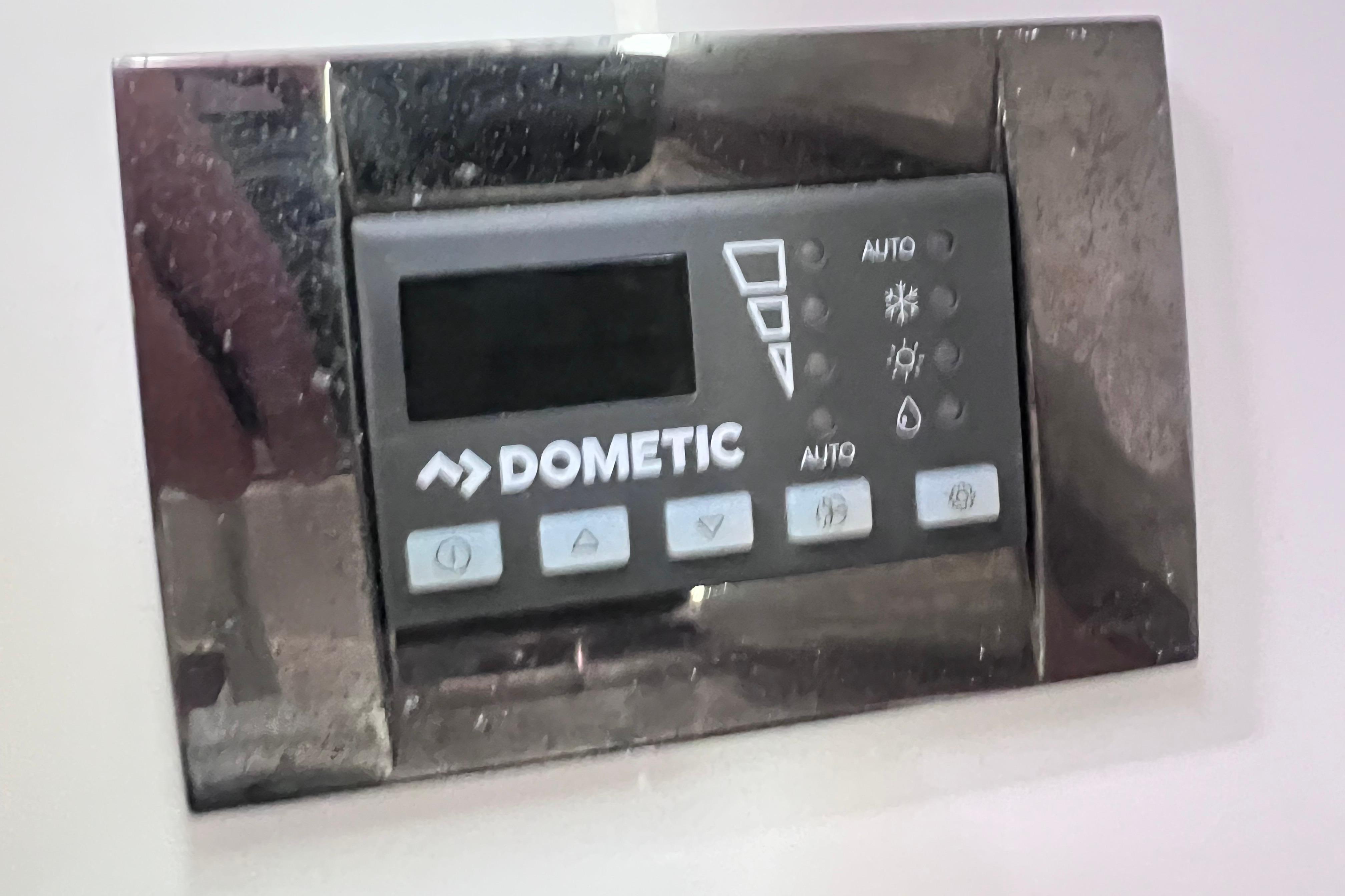 Dometic control panel on 2021 Jeanneau NC Weekender 795 Series 2 boat.