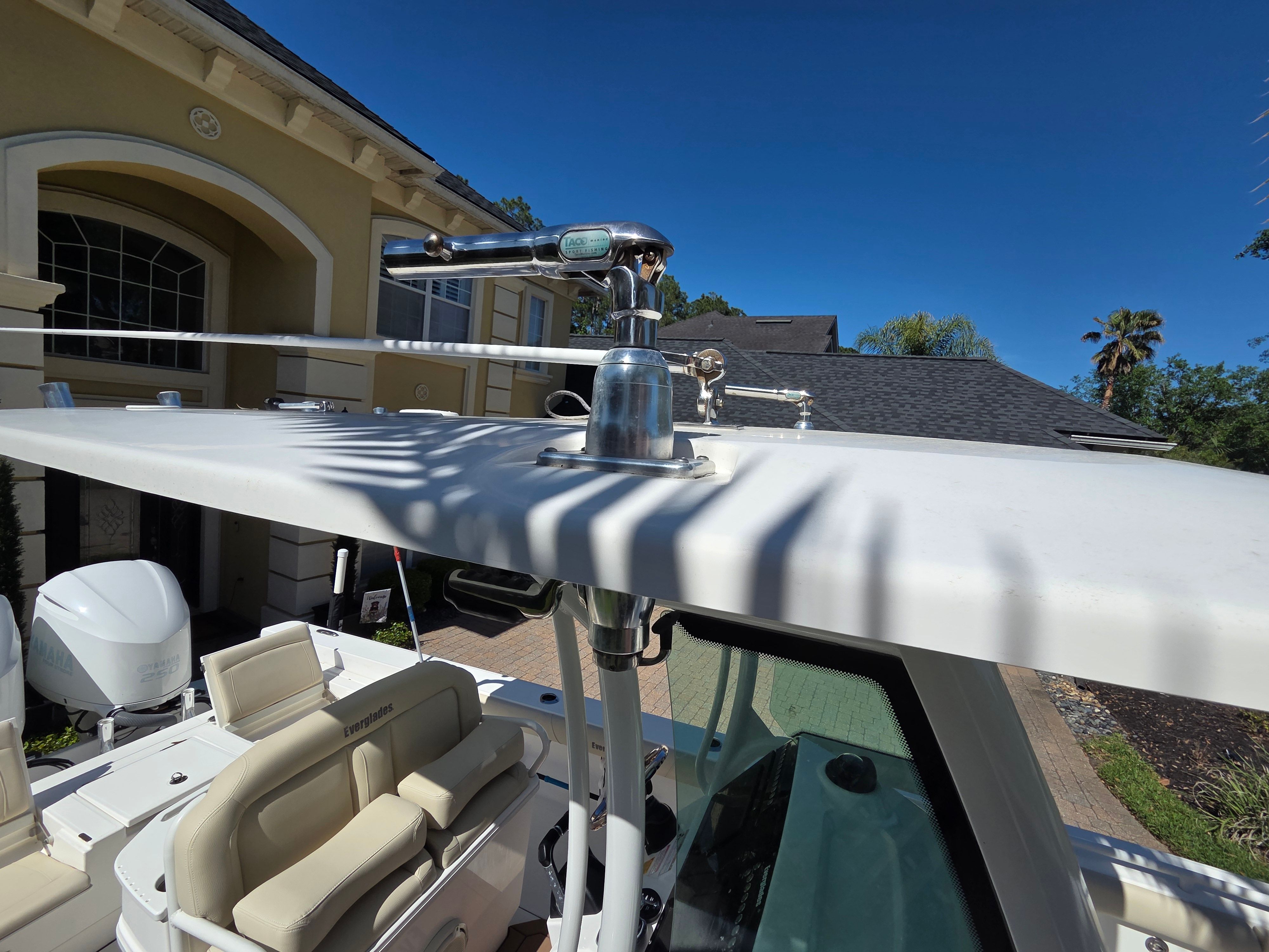 Close-up of the roof of a 2017 Everglades 273 Center Console boat, featuring stainless steel fittings.